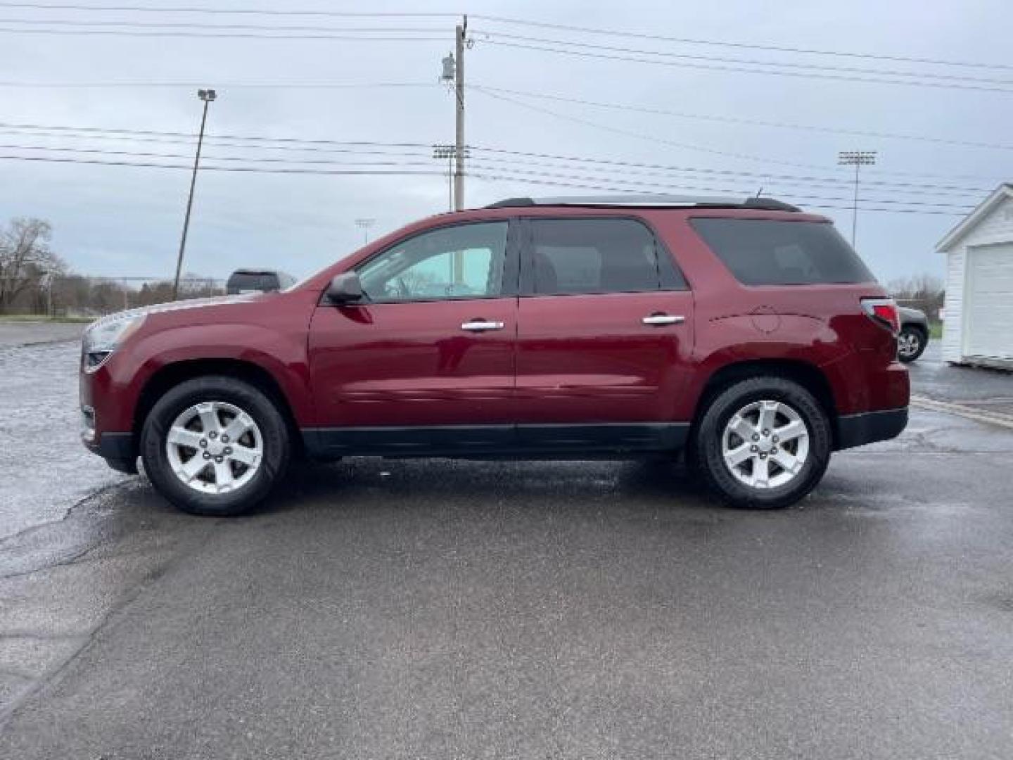 2015 Crimson Red Tincoat GMC Acadia SLE-2 AWD (1GKKVPKDXFJ) with an 3.6L V6 DOHC 24V engine, 6-Speed Automatic transmission, located at 1099 N County Rd 25A , Troy, OH, 45373, (937) 908-9800, 40.057079, -84.212883 - Photo#2