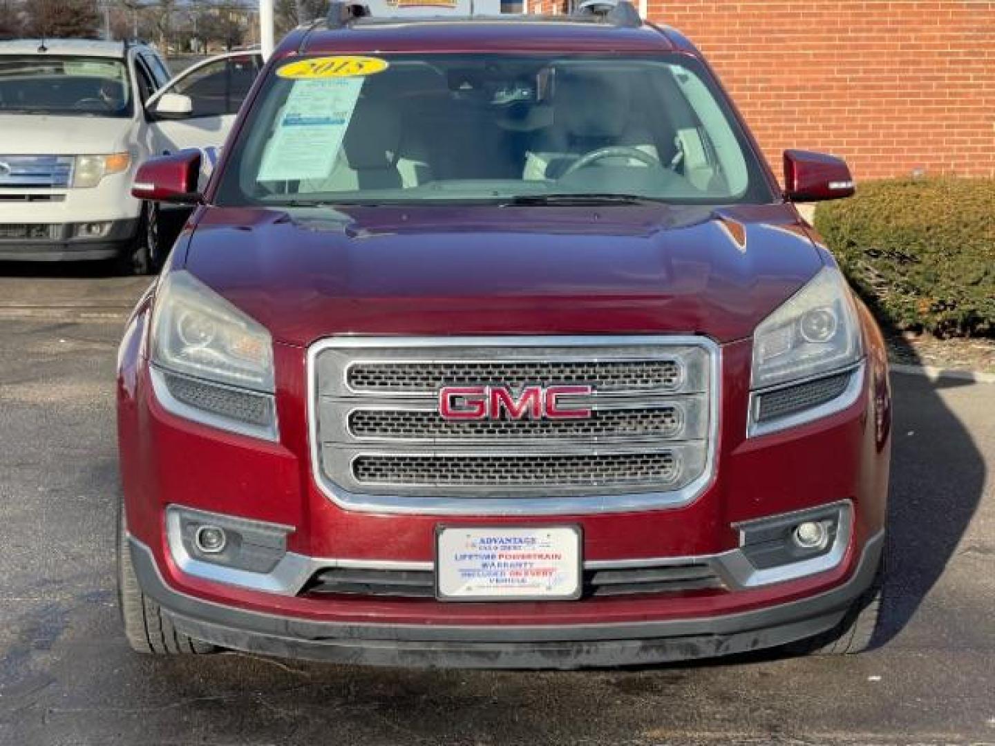 2015 Crimson Red Tincoat GMC Acadia SLT-1 FWD (1GKKRRKD7FJ) with an 3.6L V6 DOHC 24V engine, 6-Speed Automatic transmission, located at 4508 South Dixie Dr, Moraine, OH, 45439, (937) 908-9800, 39.689976, -84.218452 - Photo#2