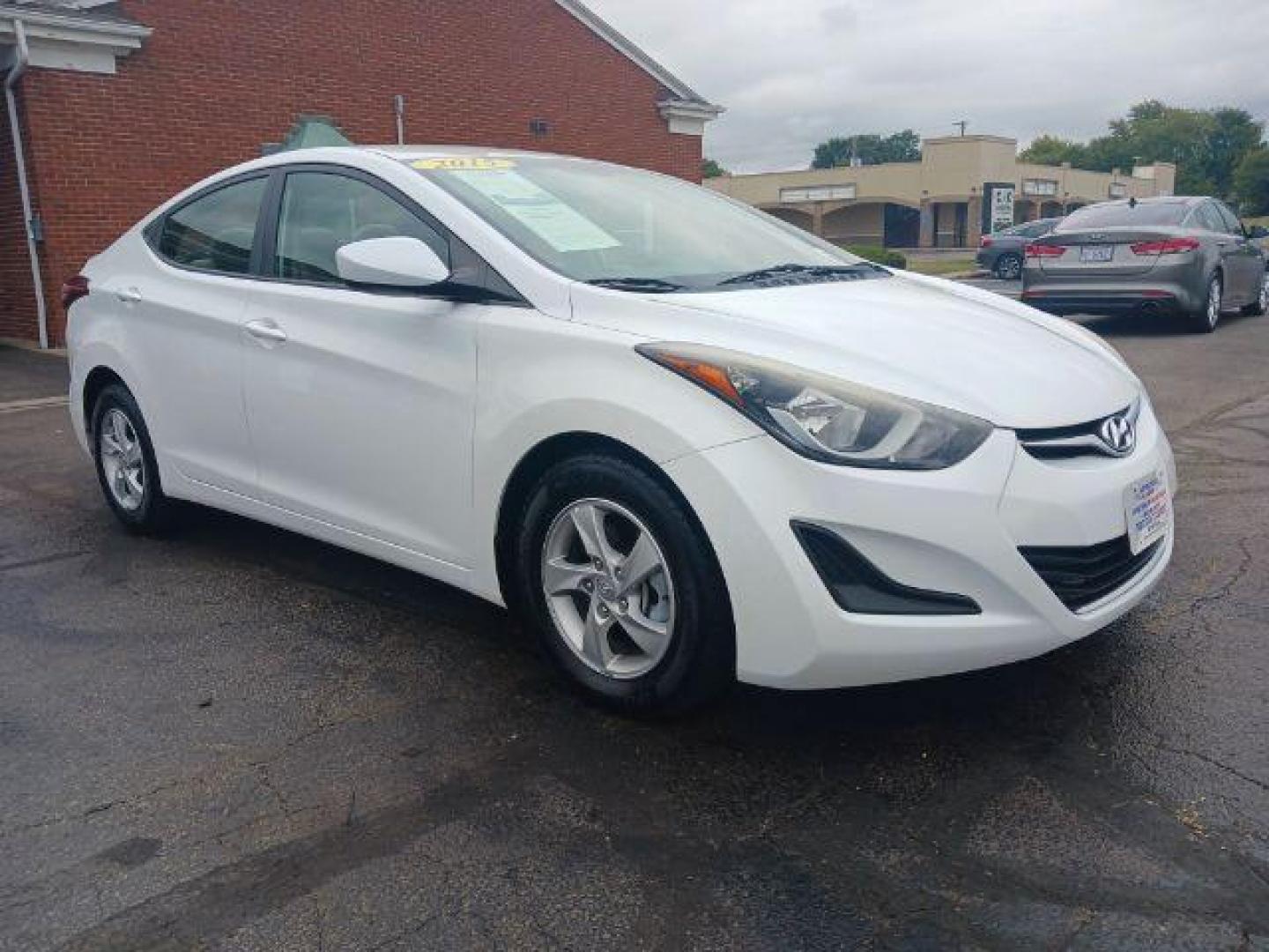 2015 Quartz White Pearl Hyundai Elantra SE 6AT (5NPDH4AE6FH) with an 1.8L L4 DOHC 16V engine, 6-Speed Automatic transmission, located at 1230 East Main St, Xenia, OH, 45385, (937) 908-9800, 39.688026, -83.910172 - Photo#0