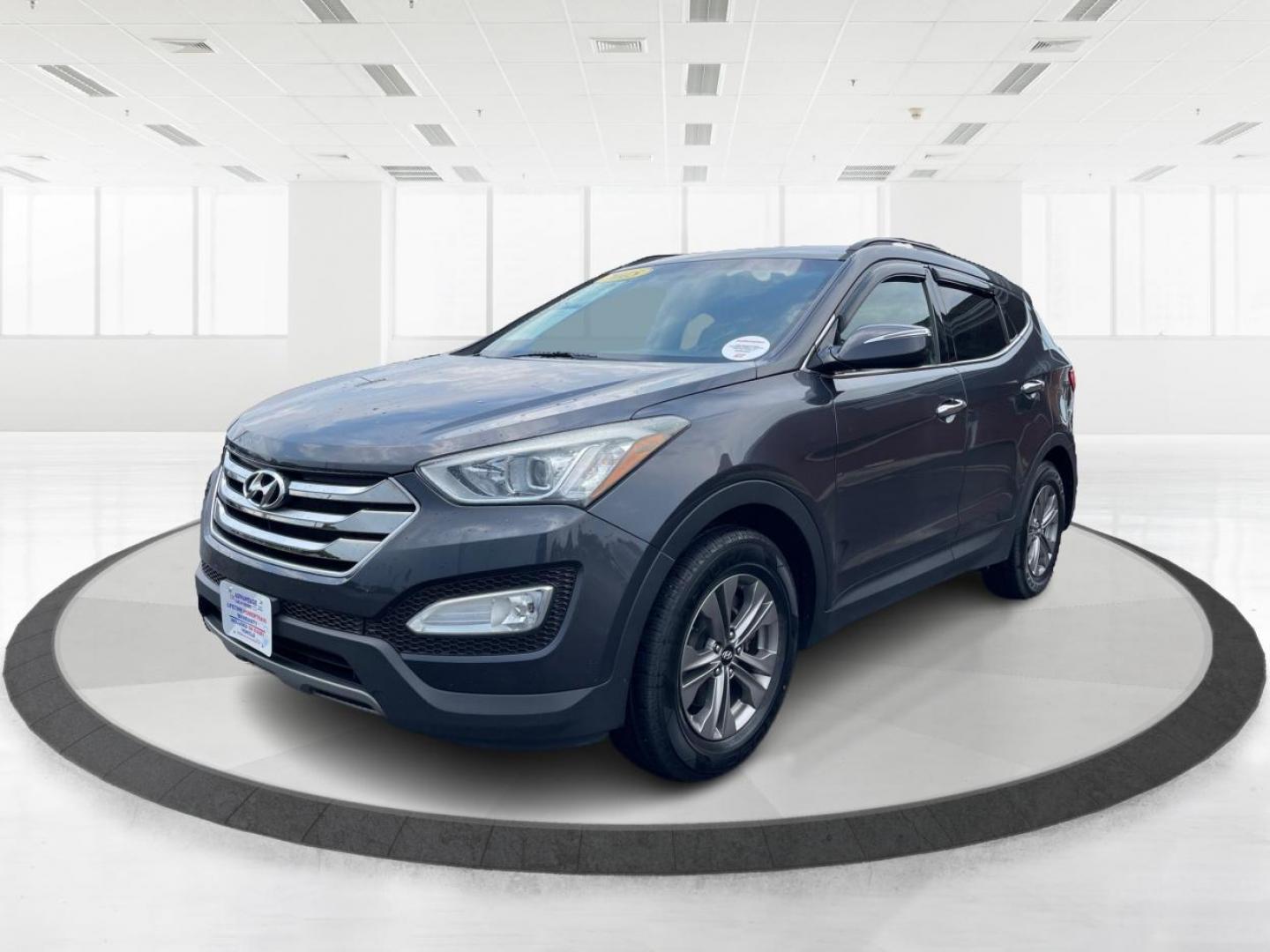 2015 Mineral Gray Hyundai Santa Fe (5XYZUDLB8FG) with an 2.4L L4 DOHC 16V engine, 6-Speed Automatic transmission, located at 880 E. National Road, Vandalia, OH, 45377, (937) 908-9800, 39.891918, -84.183594 - Photo#7