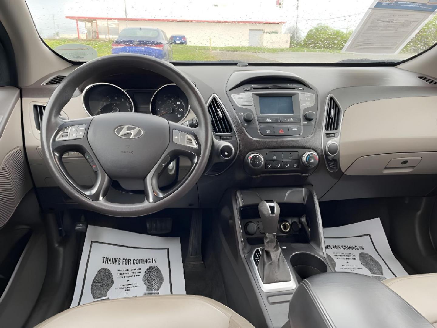 2015 Garnet Red Mica Hyundai Tucson (KM8JTCAF6FU) with an 2.0L L4 DOHC 16V engine, 6-Speed Automatic transmission, located at 1951 S Dayton Lakeview Rd., New Carlisle, OH, 45344, (937) 908-9800, 39.890999, -84.050255 - Photo#7