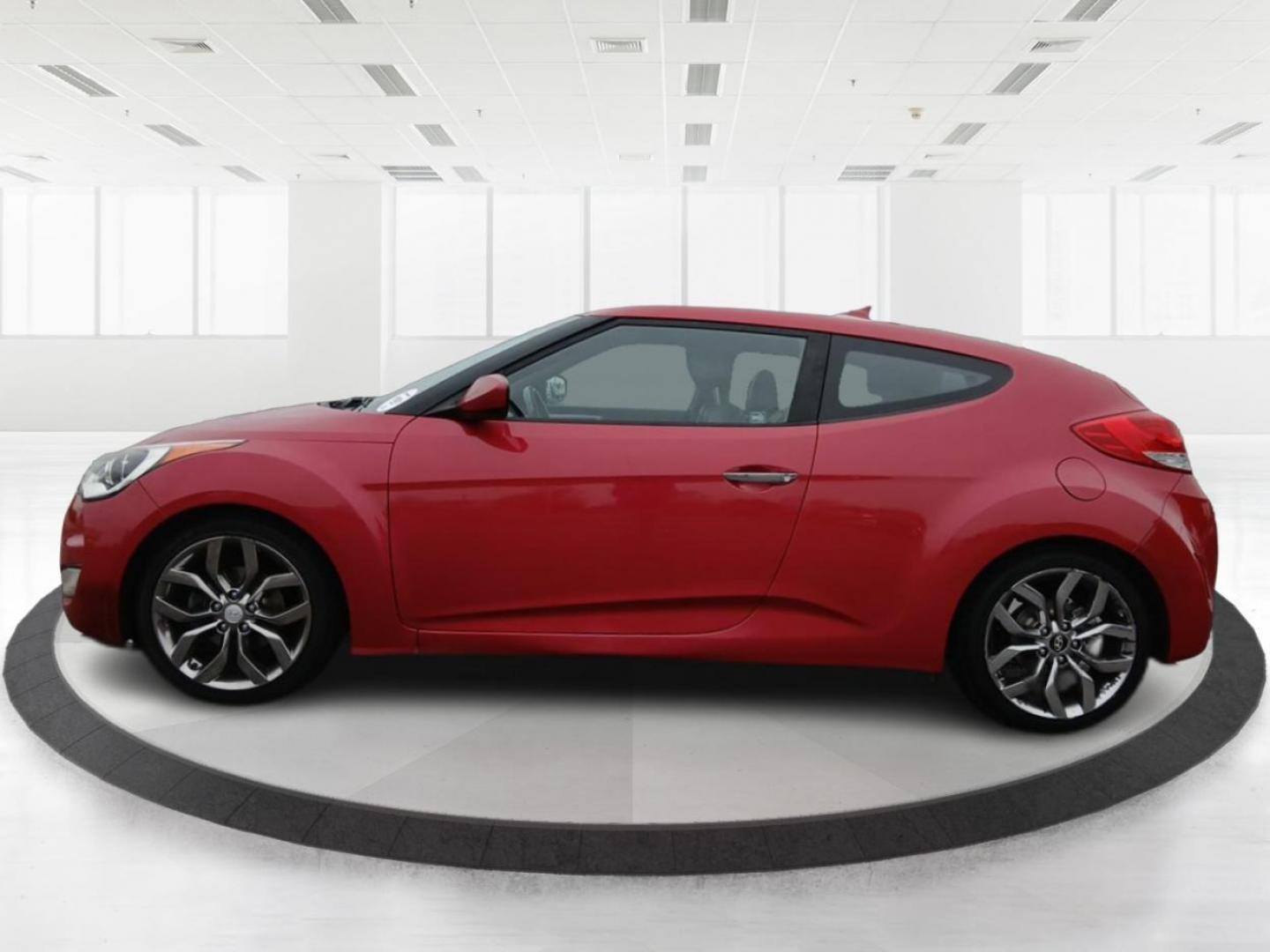 2015 Boston Red Metallic Hyundai Veloster Base 6MT (KMHTC6AD1FU) with an 1.6L L4 DOHC 16V engine, 6-Speed Manual transmission, located at 1099 N County Rd 25A , Troy, OH, 45373, (937) 908-9800, 40.057079, -84.212883 - Photo#5