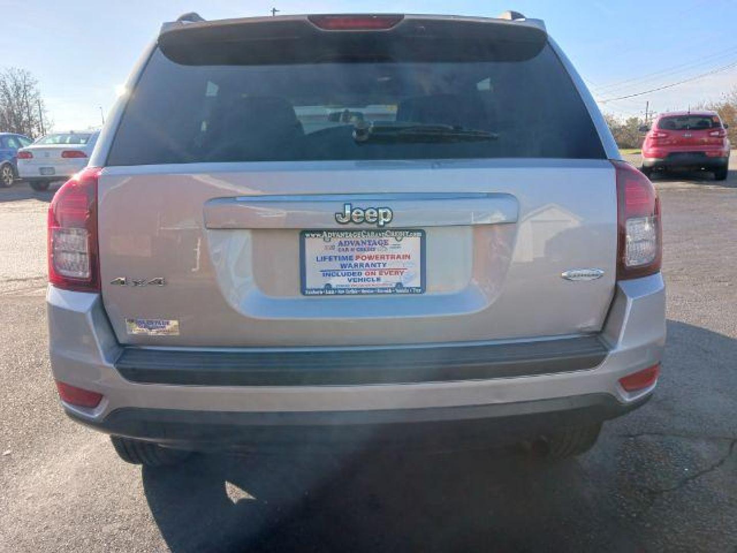 2015 Billet Silver Metallic Clear Coat Jeep Compass Latitude 4WD (1C4NJDEB0FD) with an 2.4L L4 DOHC 16V engine, 6-Speed Automatic transmission, located at 1184 Kauffman Ave, Fairborn, OH, 45324, (937) 908-9800, 39.807072, -84.030914 - Photo#5