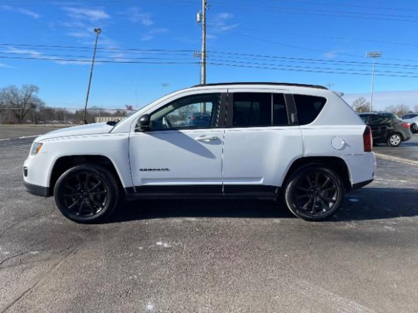 2015 Bright White Clear Coat Jeep Compass Sport 4WD (1C4NJDBB4FD) with an 2.4L L4 DOHC 16V engine, located at 1184 Kauffman Ave, Fairborn, OH, 45324, (937) 908-9800, 39.807072, -84.030914 - Photo#2