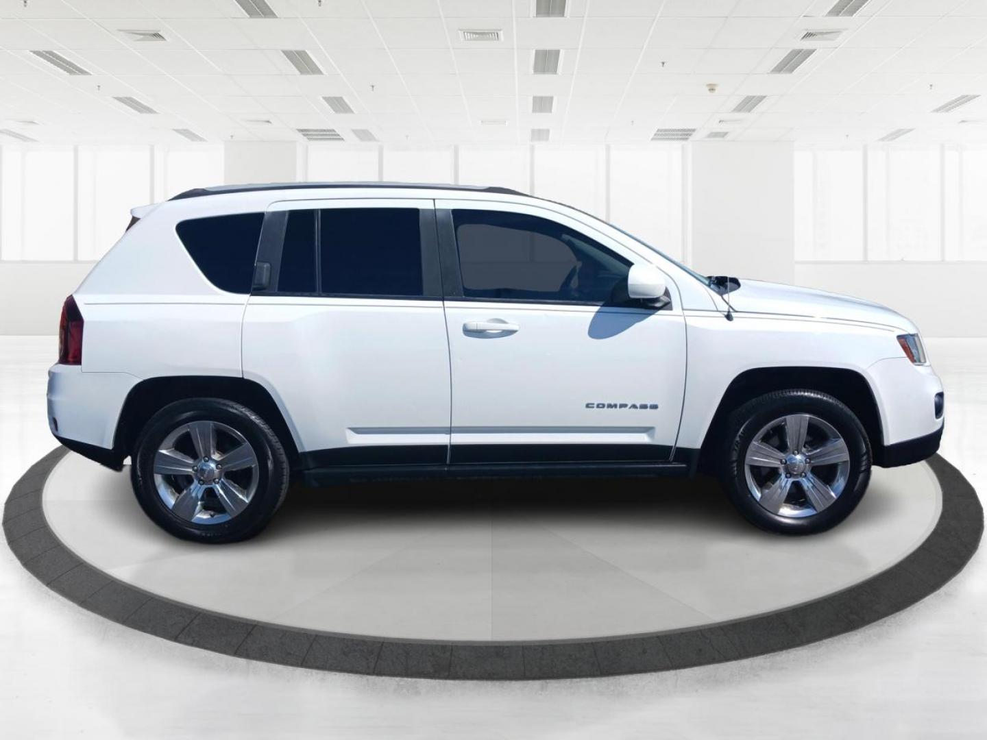 2015 Bright White Clear Coat Jeep Compass (1C4NJDEB5FD) with an 2.4L L4 DOHC 16V engine, 6-Speed Automatic transmission, located at 1951 S Dayton Lakeview Rd., New Carlisle, OH, 45344, (937) 908-9800, 39.890999, -84.050255 - Photo#1