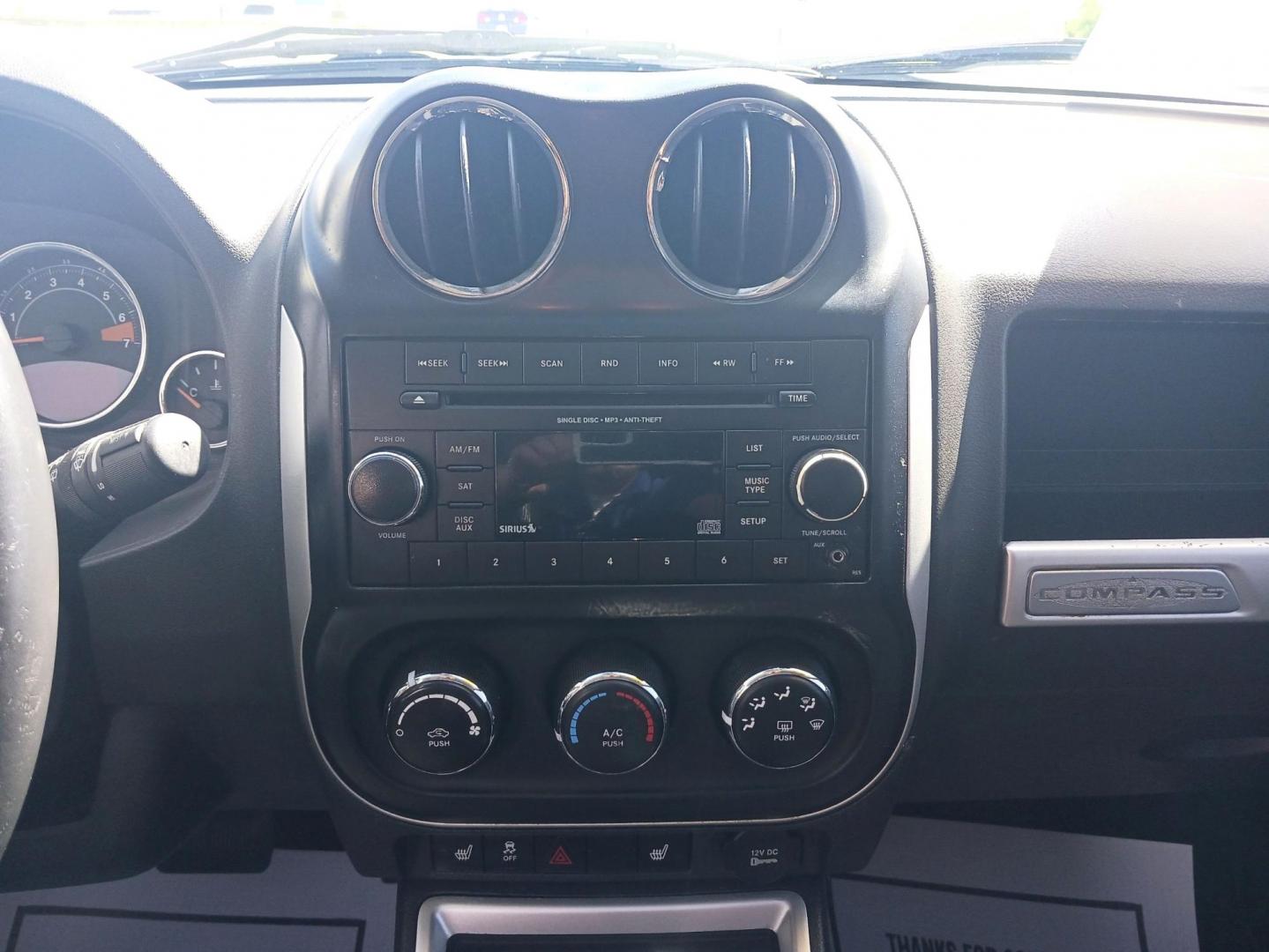 2015 Bright White Clear Coat Jeep Compass (1C4NJDEB5FD) with an 2.4L L4 DOHC 16V engine, 6-Speed Automatic transmission, located at 1951 S Dayton Lakeview Rd., New Carlisle, OH, 45344, (937) 908-9800, 39.890999, -84.050255 - Photo#12