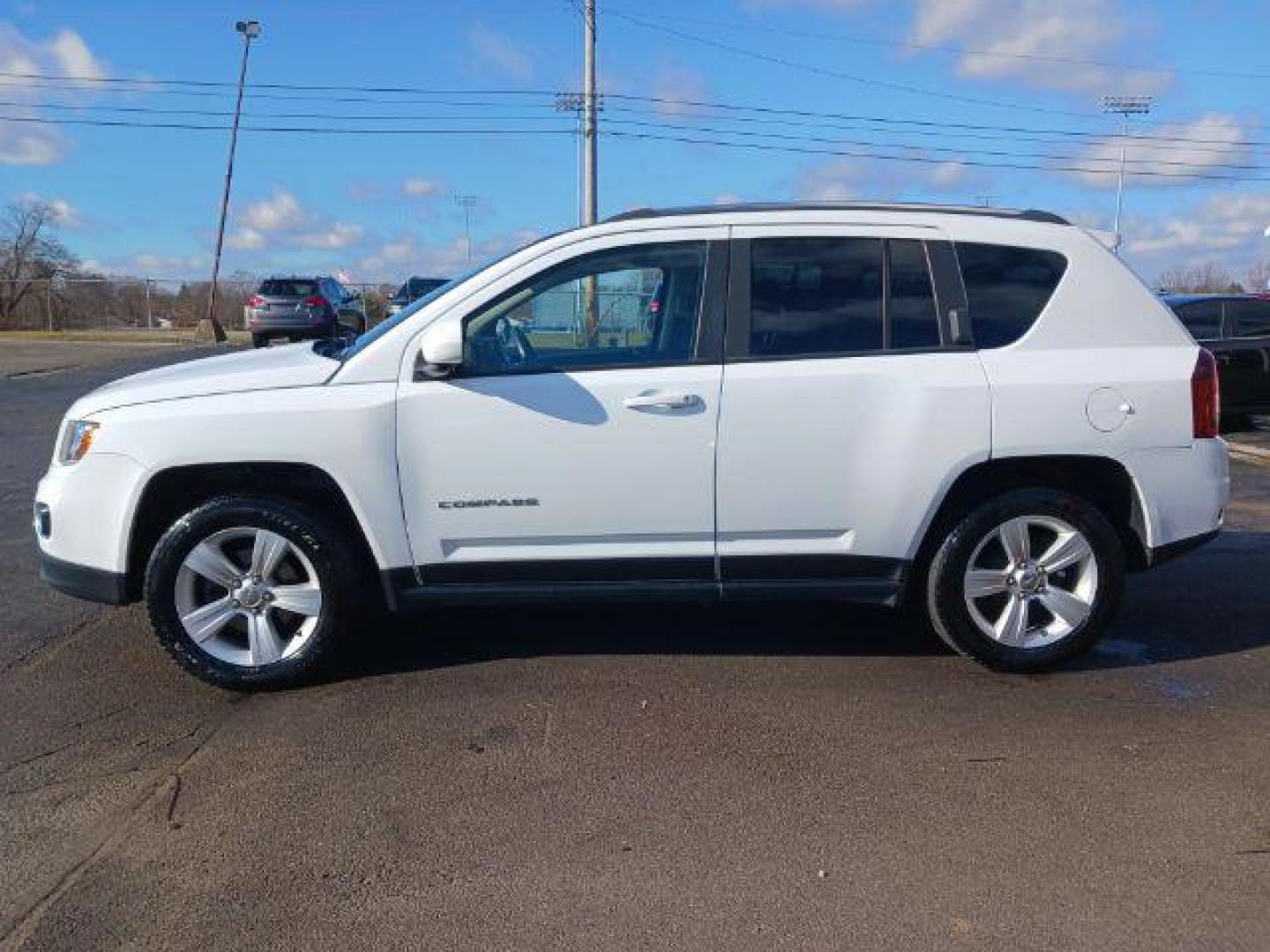 2015 Bright White Clear Coat Jeep Compass Latitude FWD (1C4NJCEA6FD) with an 2.0L L4 DOHC 16V engine, Continuously Variable Transmission transmission, located at 1951 S Dayton Lakeview Rd., New Carlisle, OH, 45344, (937) 908-9800, 39.890999, -84.050255 - Photo#3