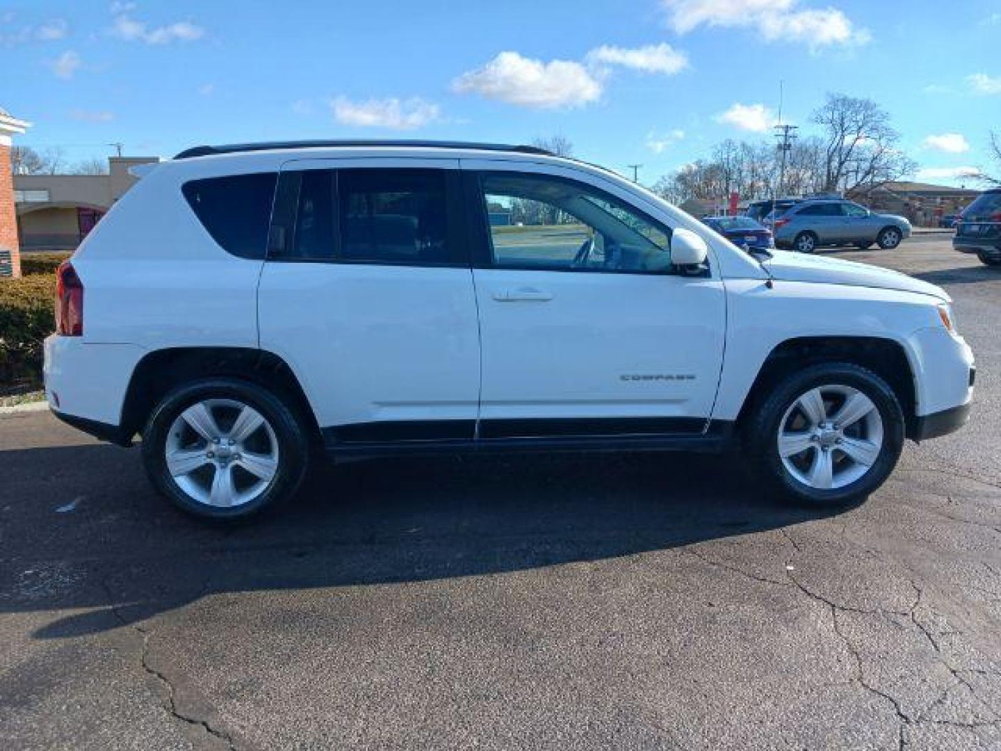 2015 Bright White Clear Coat Jeep Compass Latitude FWD (1C4NJCEA6FD) with an 2.0L L4 DOHC 16V engine, Continuously Variable Transmission transmission, located at 1951 S Dayton Lakeview Rd., New Carlisle, OH, 45344, (937) 908-9800, 39.890999, -84.050255 - Photo#4