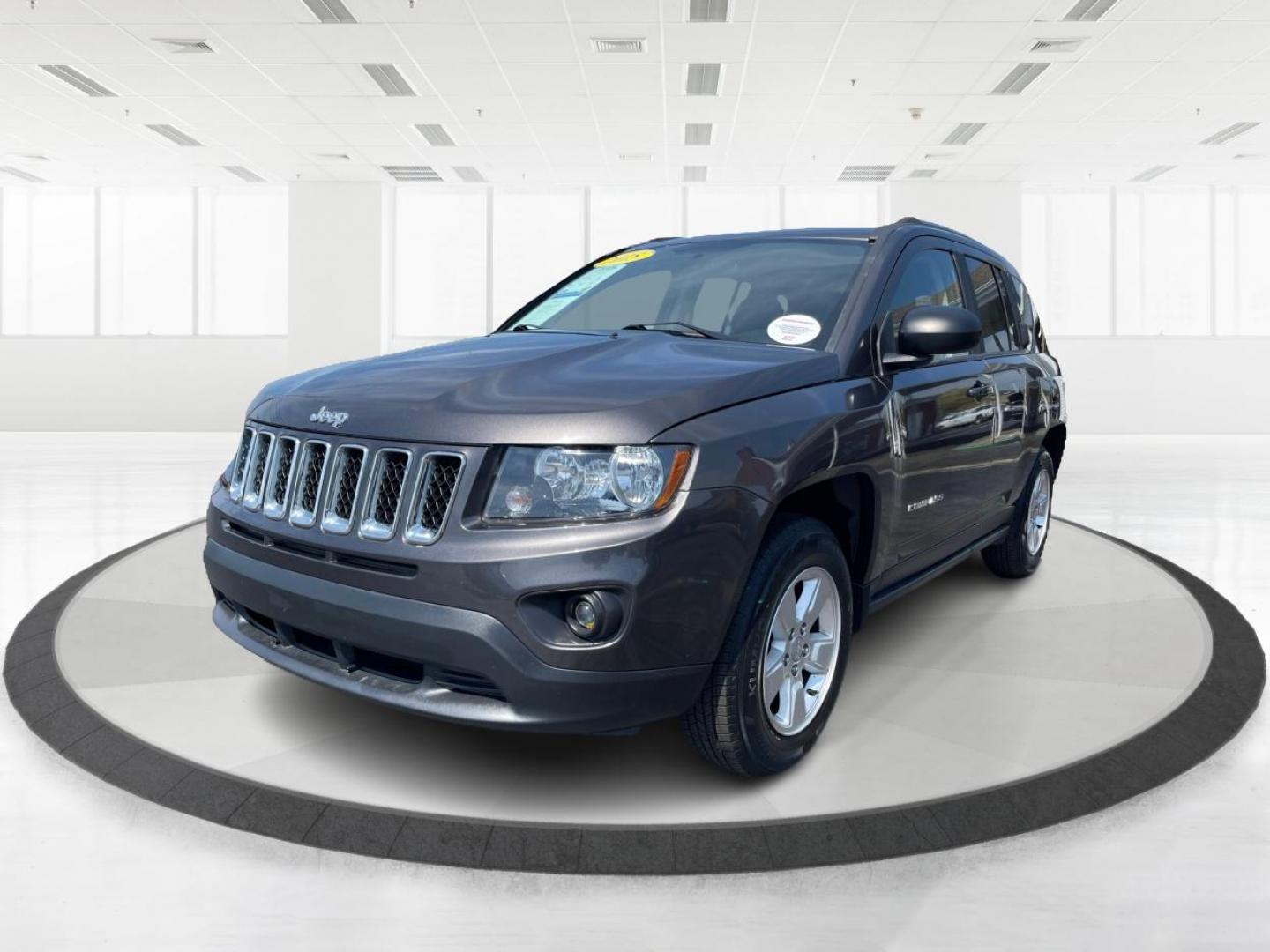 2015 Granite Crystal Metallic Clear Coat Jeep Compass Sport FWD (1C4NJCBA1FD) with an 2.0L L4 DOHC 16V engine, located at 1951 S Dayton Lakeview Rd., New Carlisle, OH, 45344, (937) 908-9800, 39.890999, -84.050255 - 2015 Jeep Compass Sport FWD - Photo#7