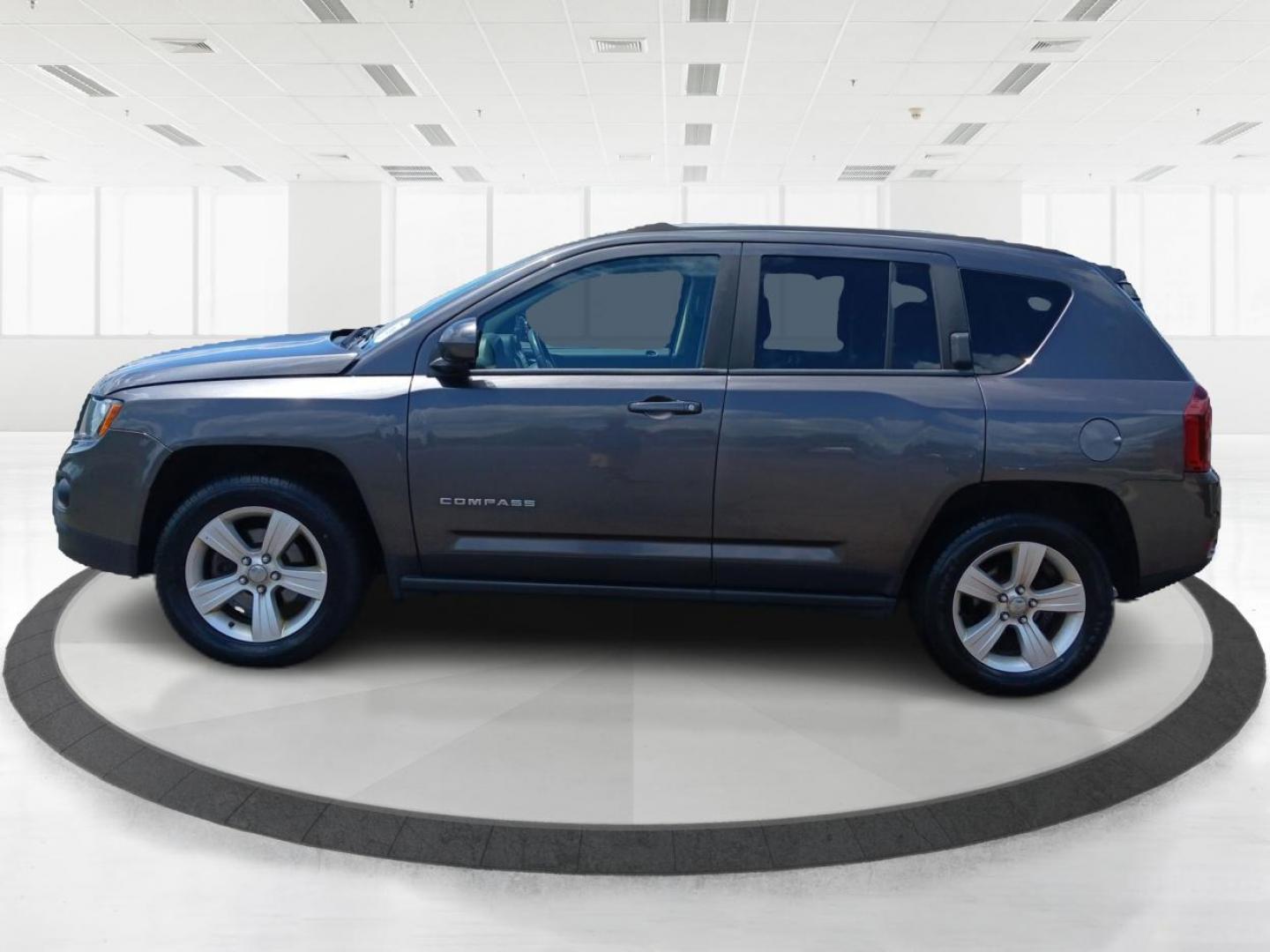 2015 Granite Crystal Metallic Clear Coat Jeep Compass (1C4NJDEB4FD) with an 2.4L L4 DOHC 16V engine, 6-Speed Automatic transmission, located at 1099 N County Rd 25A , Troy, OH, 45373, (937) 908-9800, 40.057079, -84.212883 - Photo#5