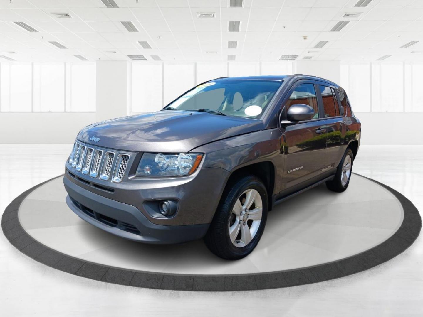 2015 Granite Crystal Metallic Clear Coat Jeep Compass (1C4NJDEB4FD) with an 2.4L L4 DOHC 16V engine, 6-Speed Automatic transmission, located at 1099 N County Rd 25A , Troy, OH, 45373, (937) 908-9800, 40.057079, -84.212883 - Photo#7