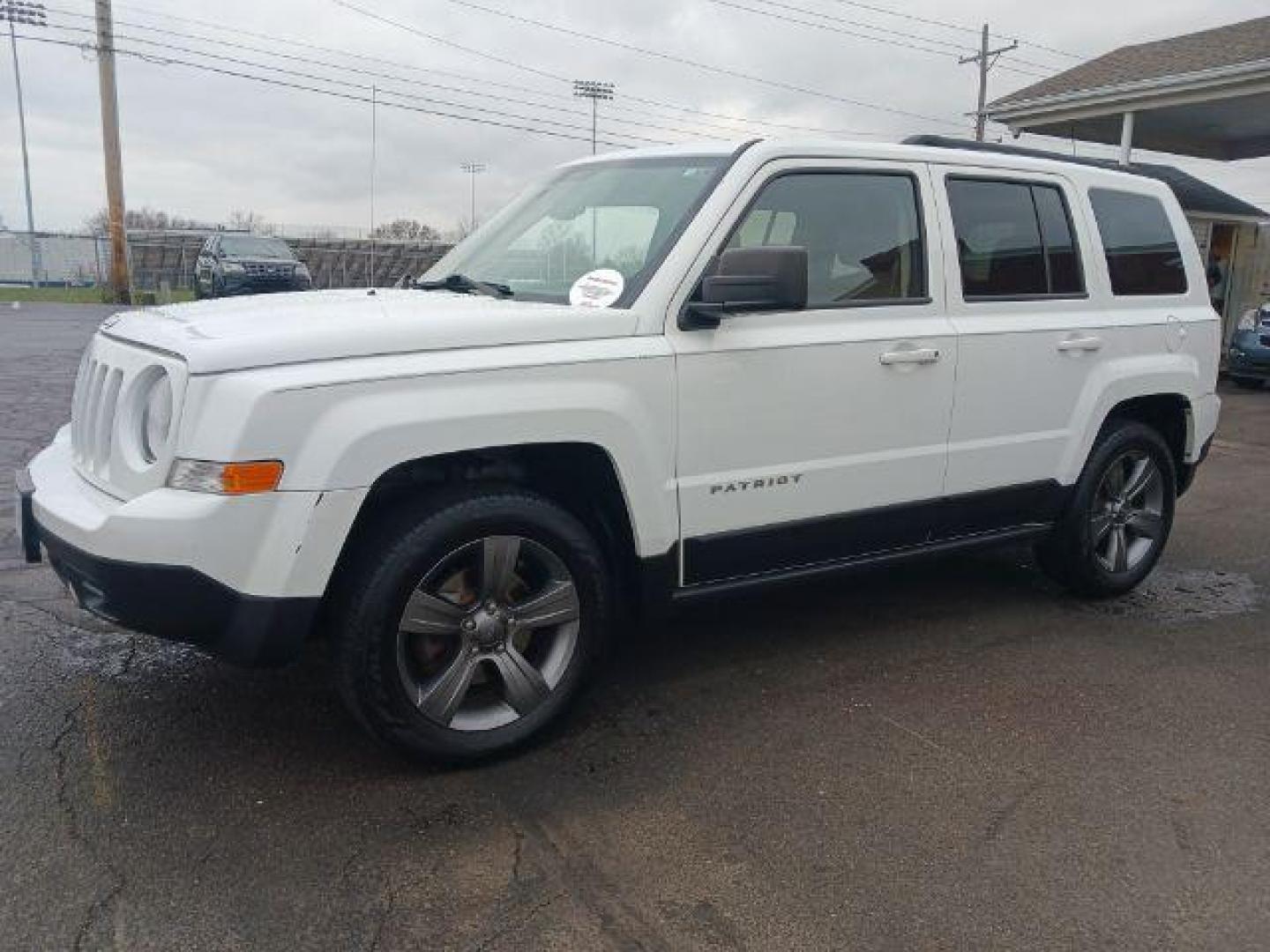 2015 Bright White Clearcoat Jeep Patriot Latitude 2WD (1C4NJPFA8FD) with an 2.0L L4 DOHC 16V engine, located at 4508 South Dixie Dr, Moraine, OH, 45439, (937) 908-9800, 39.689976, -84.218452 - Photo#2