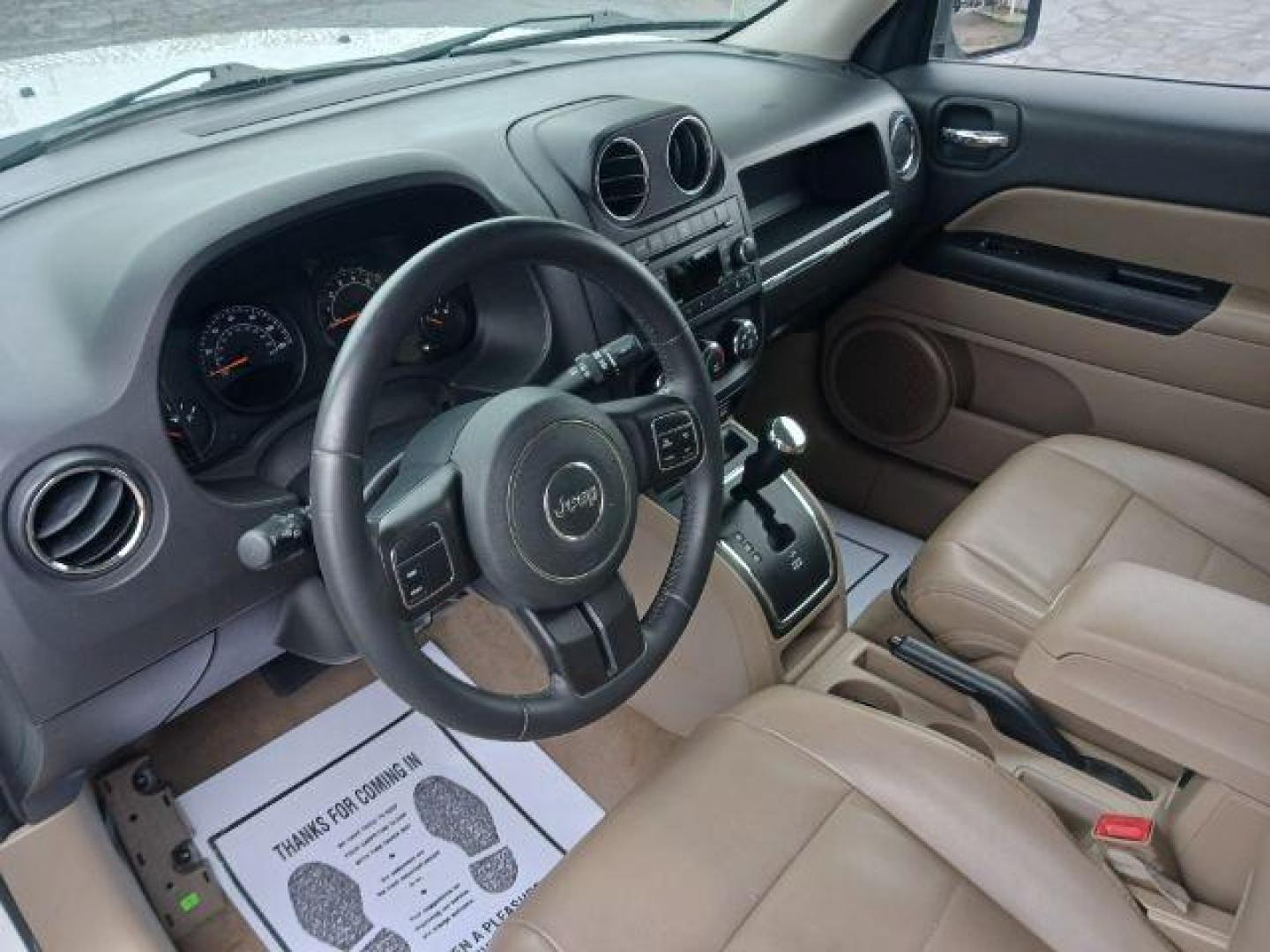 2015 Bright White Clearcoat Jeep Patriot Latitude 2WD (1C4NJPFA8FD) with an 2.0L L4 DOHC 16V engine, located at 4508 South Dixie Dr, Moraine, OH, 45439, (937) 908-9800, 39.689976, -84.218452 - Photo#6