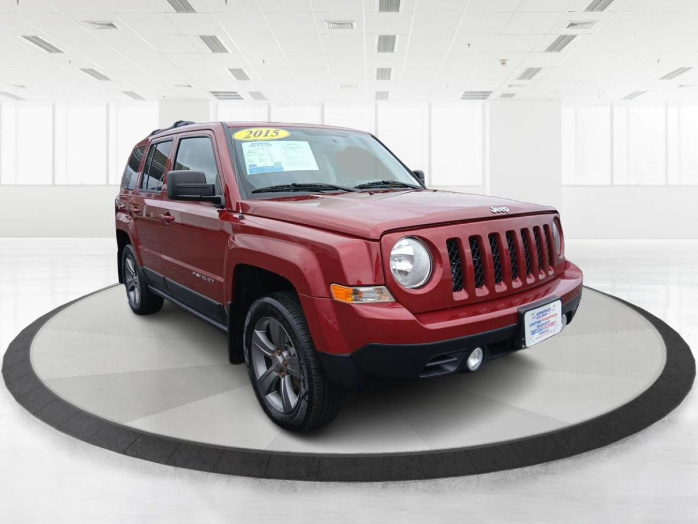 2015 Jeep Patriot Latitude 4WD (1C4NJRFB4FD) with an 2.4L L4 DOHC 16V engine, located at 880 E. National Road, Vandalia, OH, 45377, (937) 908-9800, 39.891918, -84.183594 - 2015 Jeep Patriot Latitude 4WD - Photo#0