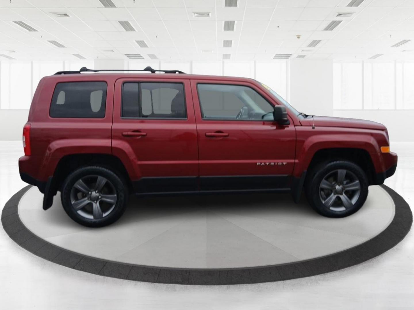 2015 Dp Cherry Red Crystal PC Jeep Patriot Latitude 4WD (1C4NJRFB4FD) with an 2.4L L4 DOHC 16V engine, located at 1184 Kauffman Ave, Fairborn, OH, 45324, (937) 908-9800, 39.807072, -84.030914 - Photo#1