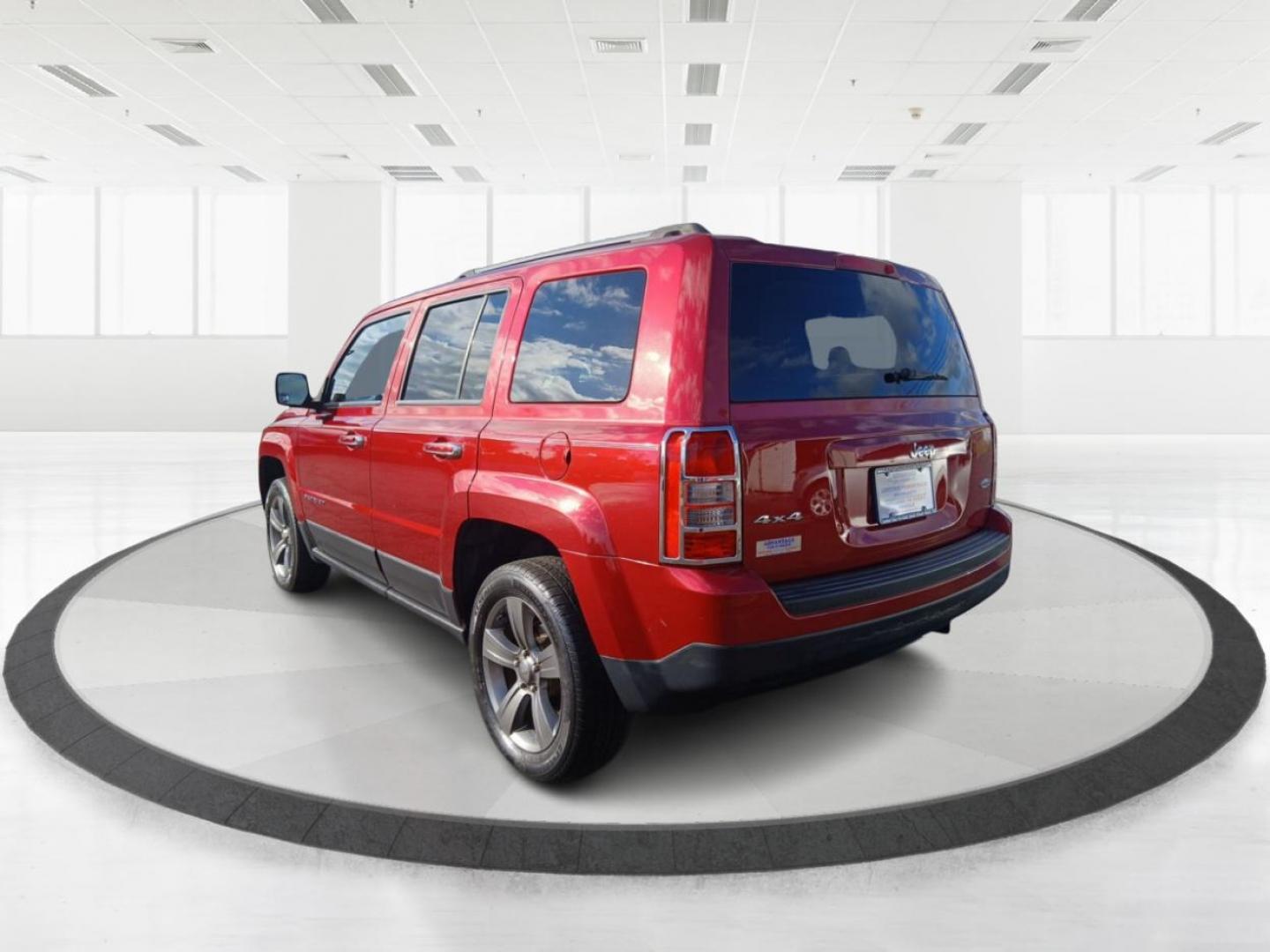 2015 Dp Cherry Red Crystal PC Jeep Patriot Latitude 4WD (1C4NJRFB8FD) with an 2.4L L4 DOHC 16V engine, located at 8750 N County Rd 25A, Piqua, OH, 45356, (937) 908-9800, 40.164391, -84.232513 - Photo#4