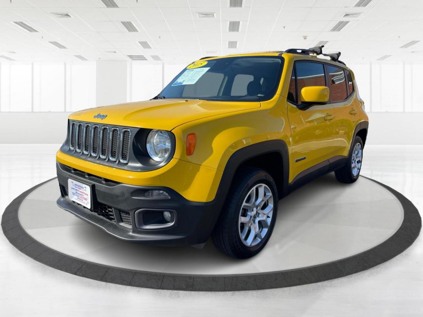 2015 Solar Yellow Jeep Renegade Latitude 4WD (ZACCJBBT3FP) with an 2.4L L4 engine, 6-Speed Manual transmission, located at 1184 Kauffman Ave, Fairborn, OH, 45324, (937) 908-9800, 39.807072, -84.030914 - Photo#7