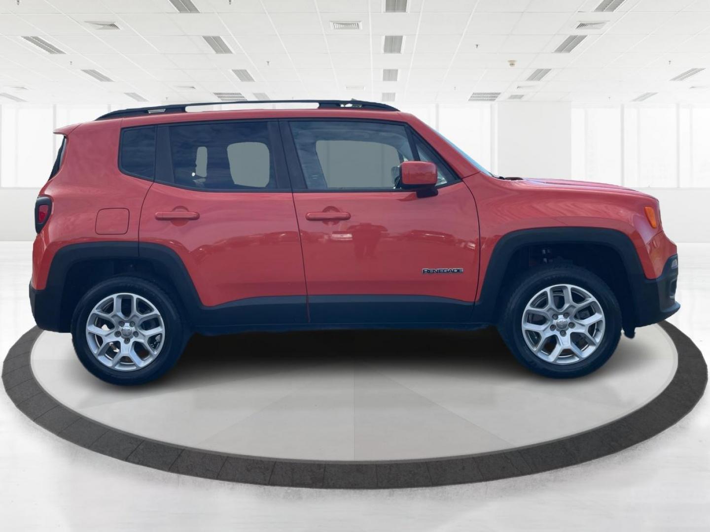 2015 Omaha Orange Jeep Renegade Latitude 4WD (ZACCJBBT2FP) with an 2.4L L4 DOHC 16V engine, 6-Speed Manual transmission, located at 1951 S Dayton Lakeview Rd., New Carlisle, OH, 45344, (937) 908-9800, 39.890999, -84.050255 - Photo#1