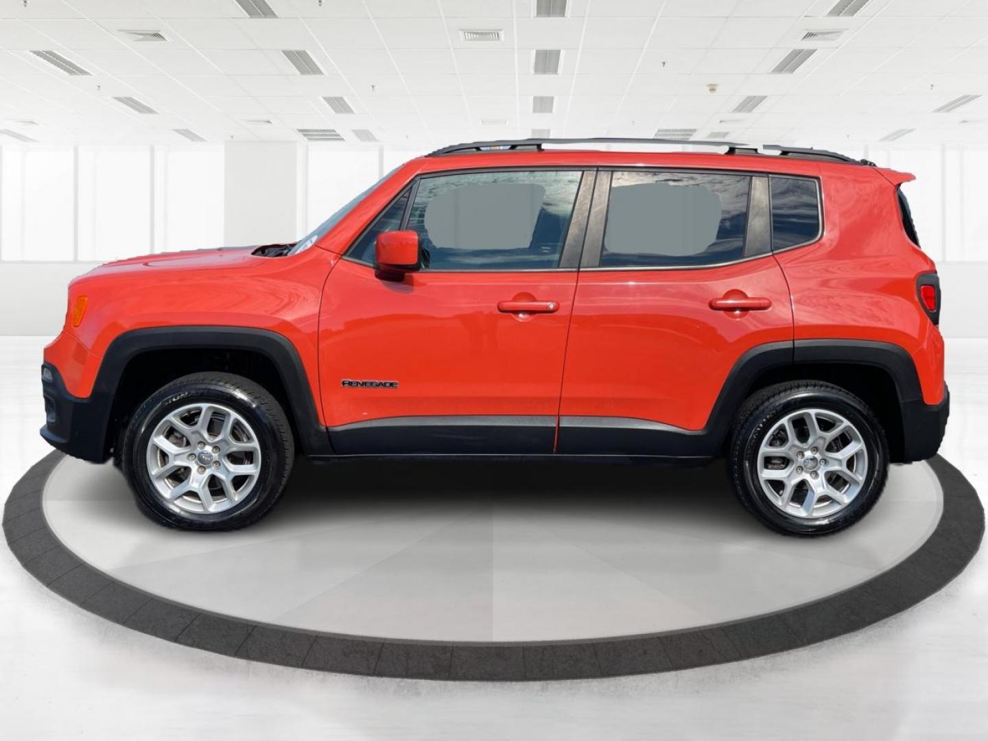 2015 Omaha Orange Jeep Renegade Latitude 4WD (ZACCJBBT2FP) with an 2.4L L4 DOHC 16V engine, 6-Speed Manual transmission, located at 1951 S Dayton Lakeview Rd., New Carlisle, OH, 45344, (937) 908-9800, 39.890999, -84.050255 - Photo#5