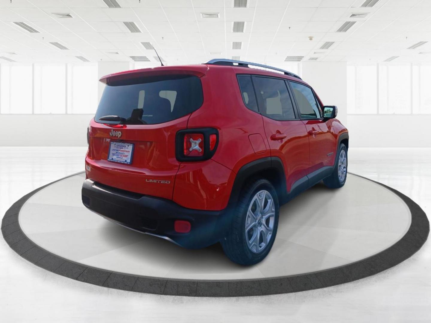 2015 Colorado Red Jeep Renegade Limited FWD (ZACCJADT0FP) with an 2.4L L4 engine, 9-Speed Automatic transmission, located at 880 E. National Road, Vandalia, OH, 45377, (937) 908-9800, 39.891918, -84.183594 - Photo#2