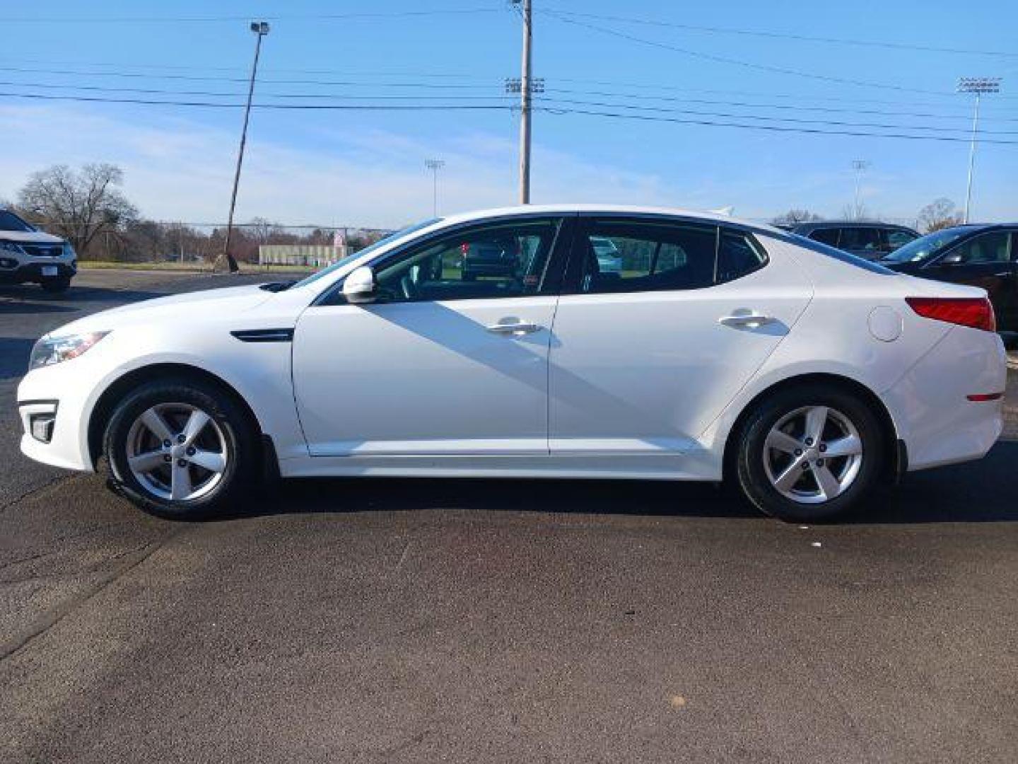 2015 Snow White Pearl Kia Optima LX (KNAGM4A71F5) with an 2.4L L4 DOHC 16V engine, 6-Speed Automatic transmission, located at 4508 South Dixie Dr, Moraine, OH, 45439, (937) 908-9800, 39.689976, -84.218452 - Photo#3