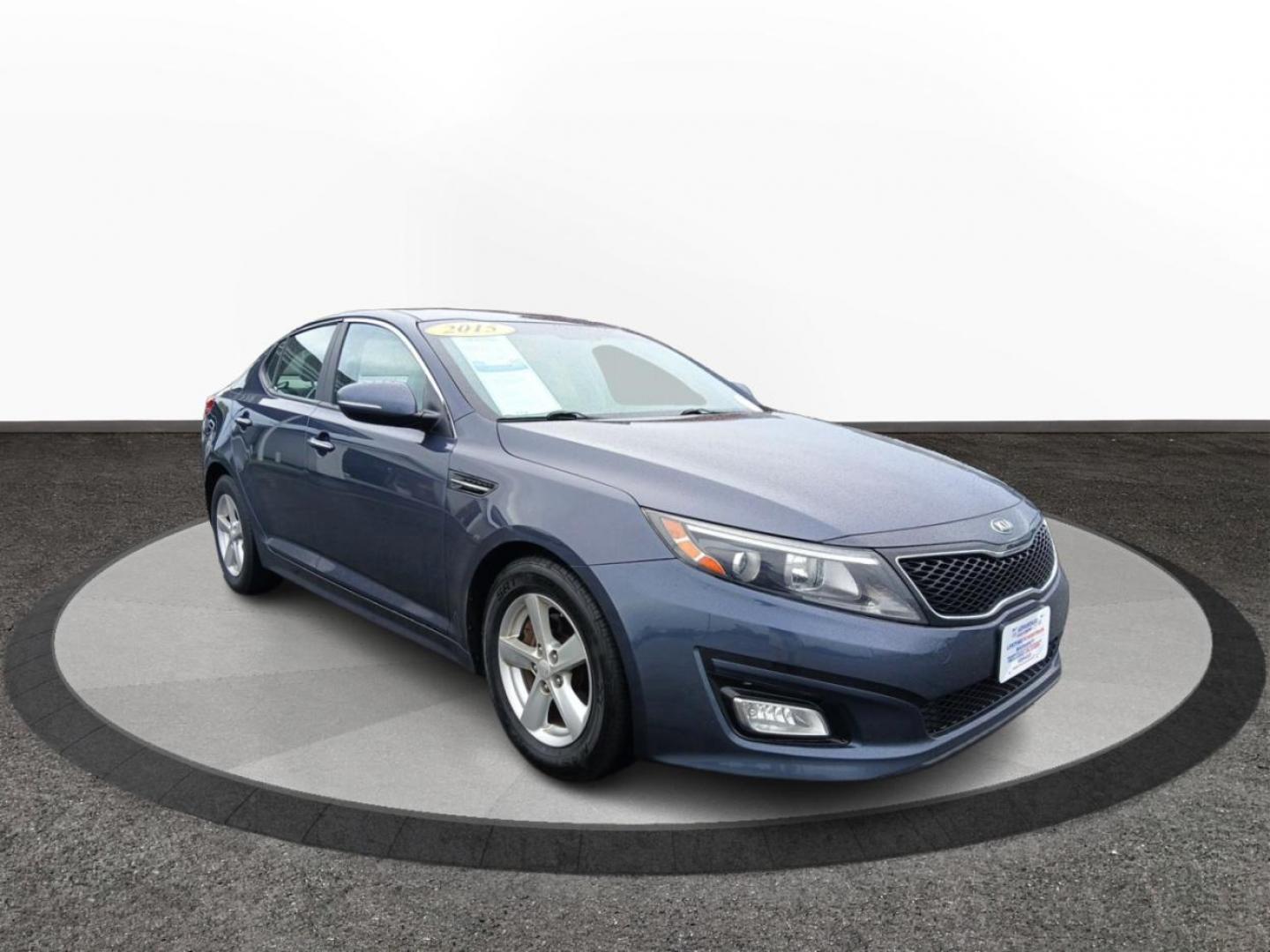 2015 Smokey Blue Kia Optima LX (KNAGM4A72F5) with an 2.4L L4 DOHC 16V engine, 6-Speed Automatic transmission, located at 1230 East Main St, Xenia, OH, 45385, (937) 908-9800, 39.688026, -83.910172 - Photo#0