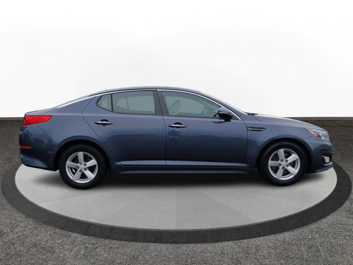 2015 Smokey Blue Kia Optima LX (KNAGM4A72F5) with an 2.4L L4 DOHC 16V engine, 6-Speed Automatic transmission, located at 1230 East Main St, Xenia, OH, 45385, (937) 908-9800, 39.688026, -83.910172 - Photo#1