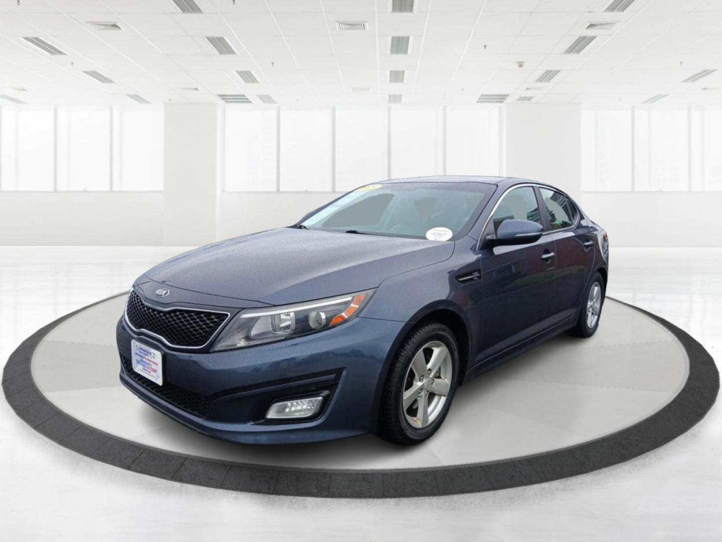 2015 Smokey Blue Kia Optima LX (KNAGM4A72F5) with an 2.4L L4 DOHC 16V engine, 6-Speed Automatic transmission, located at 1230 East Main St, Xenia, OH, 45385, (937) 908-9800, 39.688026, -83.910172 - Photo#7