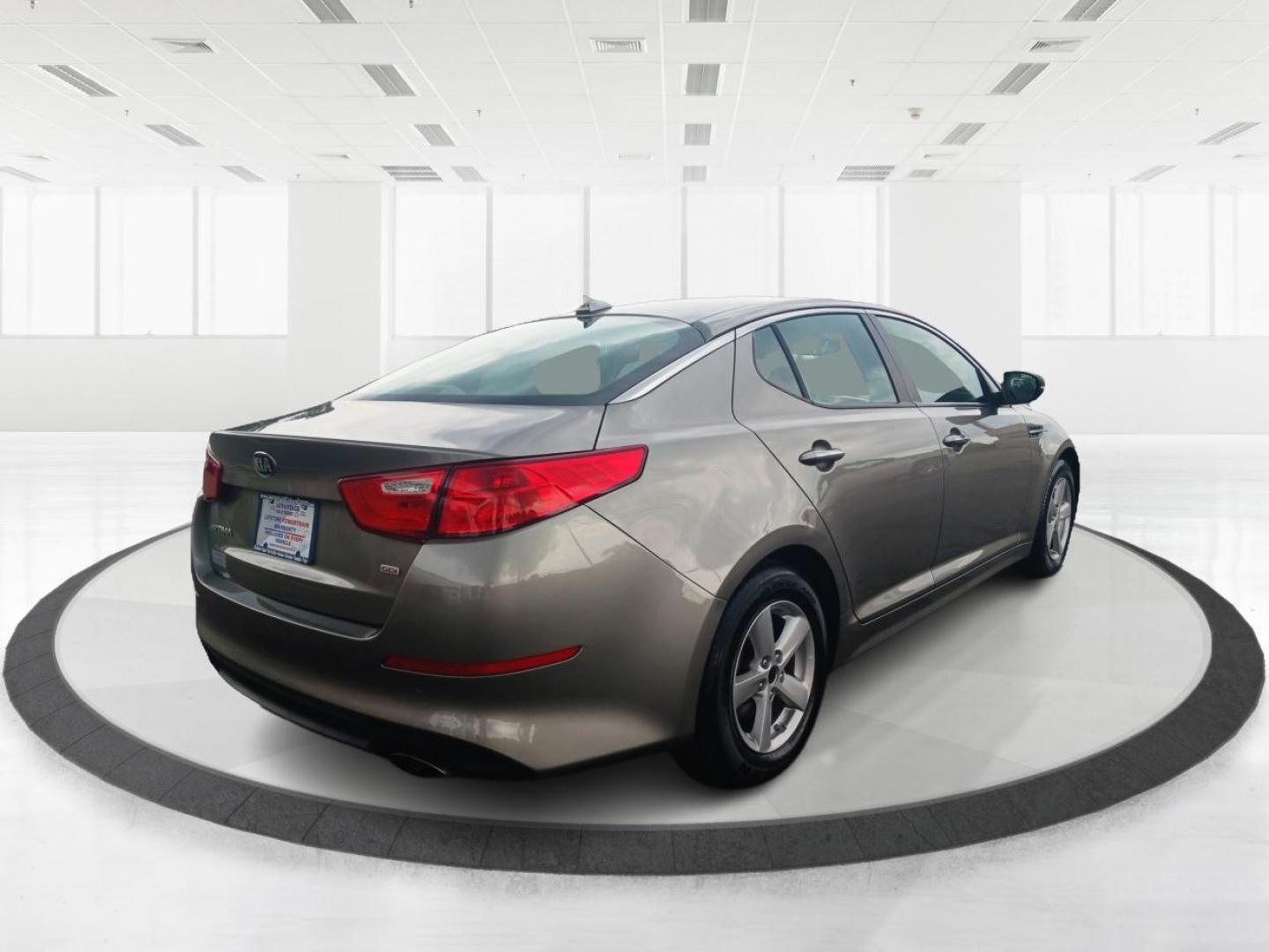 2015 Satin Metal Kia Optima (5XXGM4A77FG) with an 2.4L L4 DOHC 16V engine, 6-Speed Automatic transmission, located at 401 Woodman Dr, Riverside, OH, 45431, (937) 908-9800, 39.760899, -84.123421 - Photo#2