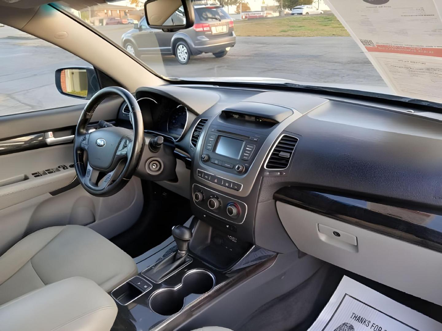 2015 Titanium Silver Kia Sorento LX 2WD (5XYKT4A62FG) with an 2.4L L4 DOHC 16V engine, 6-Speed Automatic transmission, located at 1099 N County Rd 25A , Troy, OH, 45373, (937) 908-9800, 40.057079, -84.212883 - Photo#8