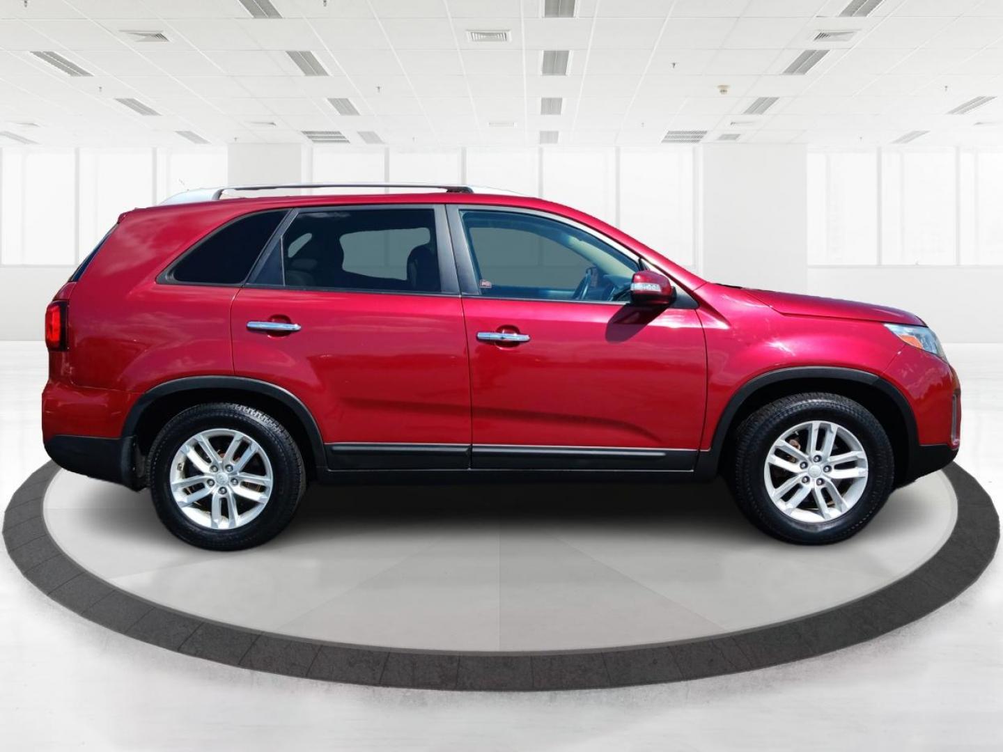 2015 Remington Red Metallic Kia Sorento (5XYKT4A65FG) with an 2.4L L4 DOHC 16V engine, 6-Speed Automatic transmission, located at 4508 South Dixie Dr, Moraine, OH, 45439, (937) 908-9800, 39.689976, -84.218452 - Photo#1