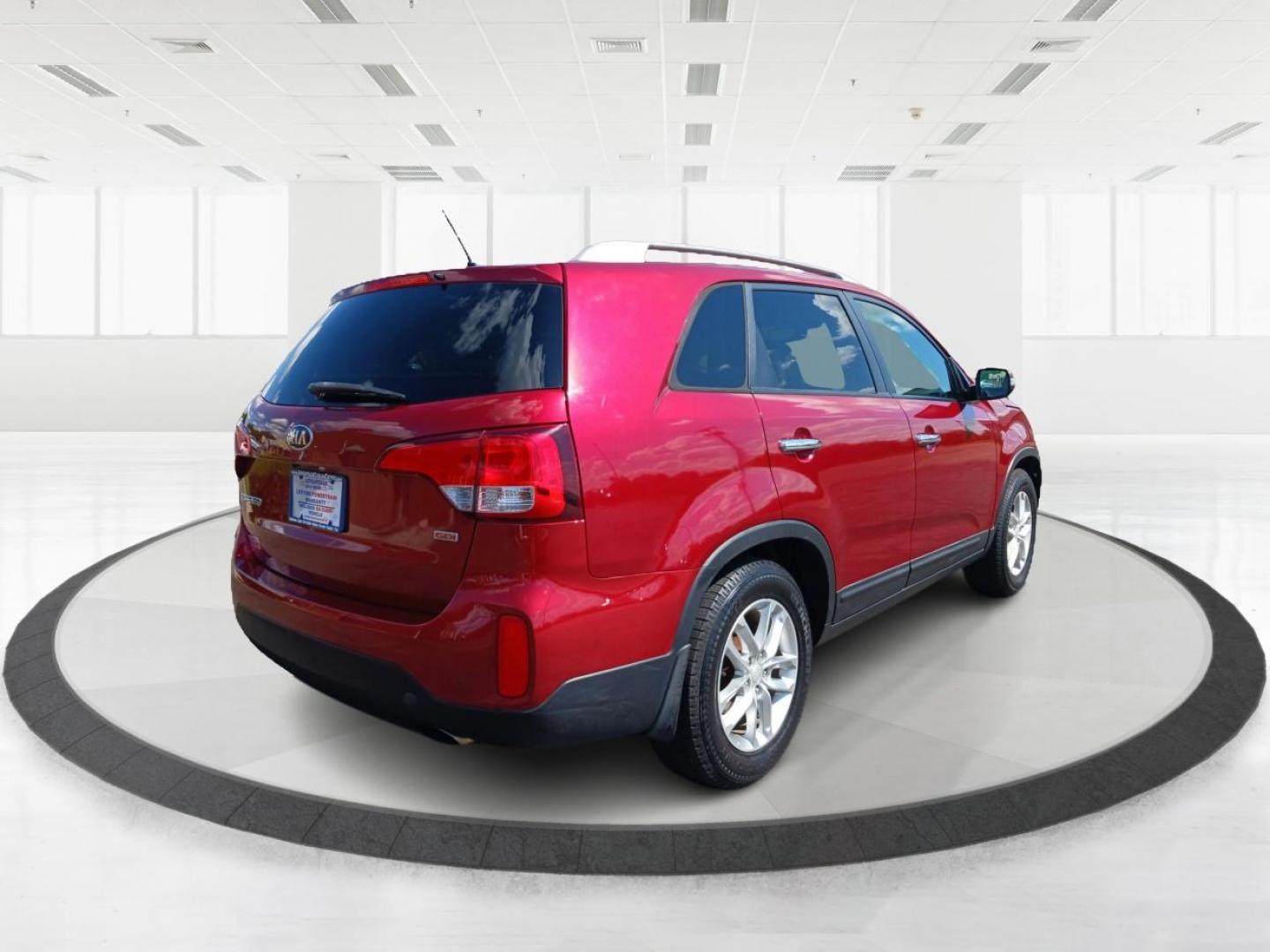 2015 Remington Red Metallic Kia Sorento (5XYKT4A65FG) with an 2.4L L4 DOHC 16V engine, 6-Speed Automatic transmission, located at 4508 South Dixie Dr, Moraine, OH, 45439, (937) 908-9800, 39.689976, -84.218452 - Photo#2