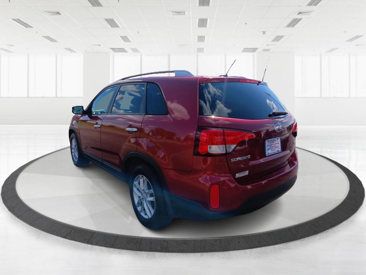 2015 Remington Red Metallic Kia Sorento (5XYKT4A65FG) with an 2.4L L4 DOHC 16V engine, 6-Speed Automatic transmission, located at 4508 South Dixie Dr, Moraine, OH, 45439, (937) 908-9800, 39.689976, -84.218452 - Photo#4