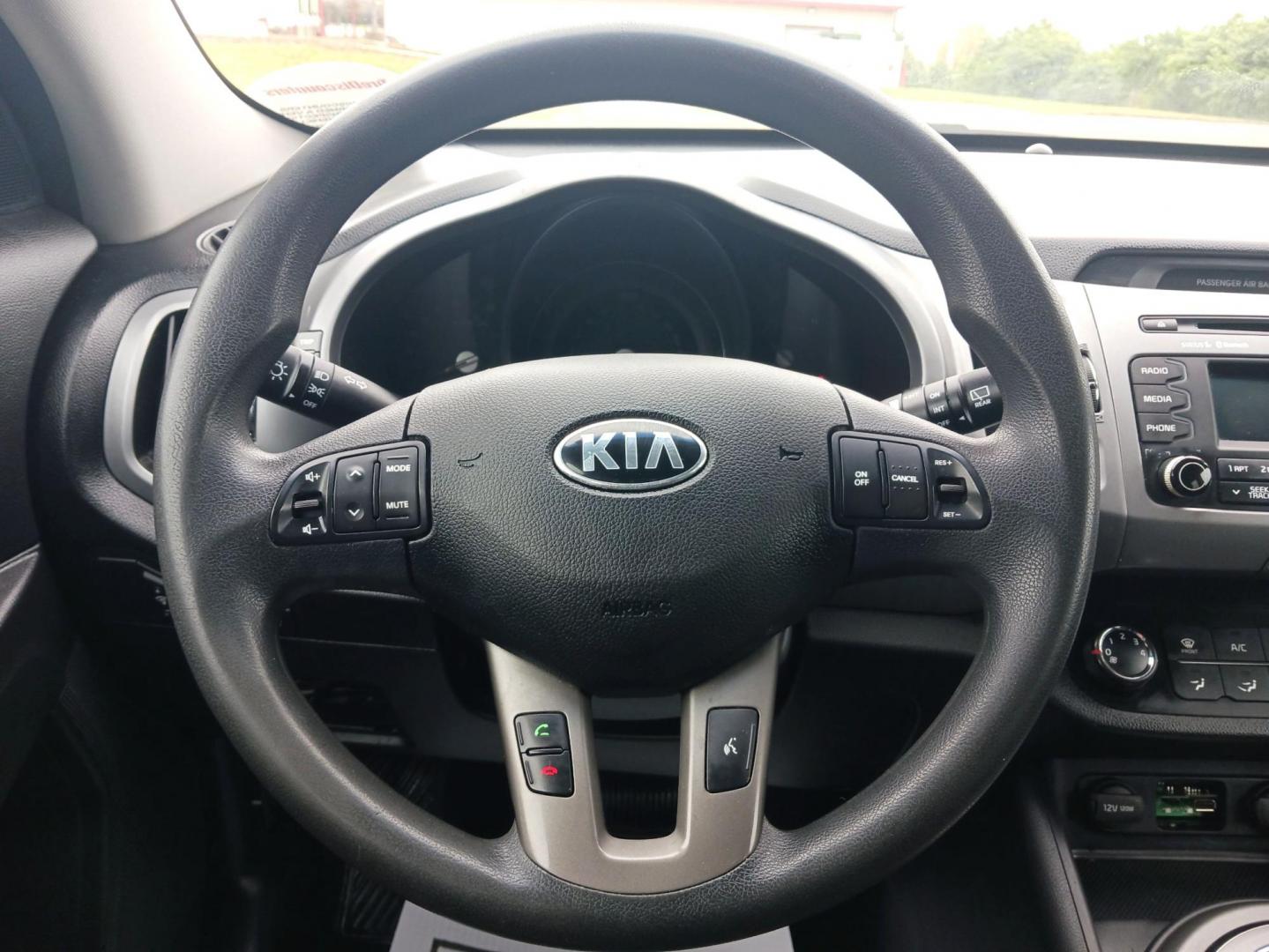 2015 Black Cherry Kia Sportage (KNDPBCAC2F7) with an 2.4L V6 DOHC 24V engine, 6-Speed Automatic transmission, located at 401 Woodman Dr, Riverside, OH, 45431, (937) 908-9800, 39.760899, -84.123421 - Photo#15