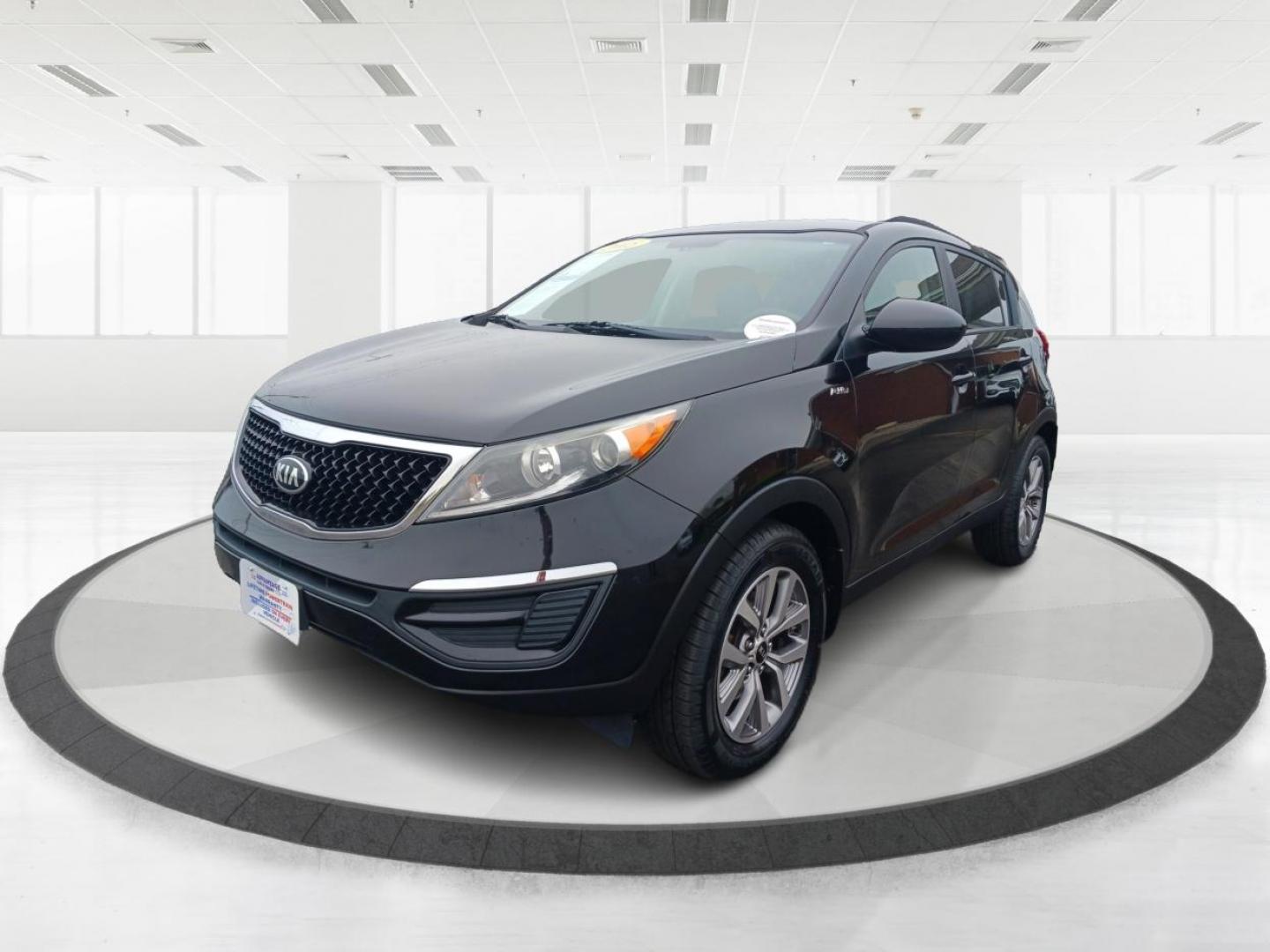 2015 Black Cherry Kia Sportage (KNDPBCAC2F7) with an 2.4L V6 DOHC 24V engine, 6-Speed Automatic transmission, located at 401 Woodman Dr, Riverside, OH, 45431, (937) 908-9800, 39.760899, -84.123421 - Photo#7