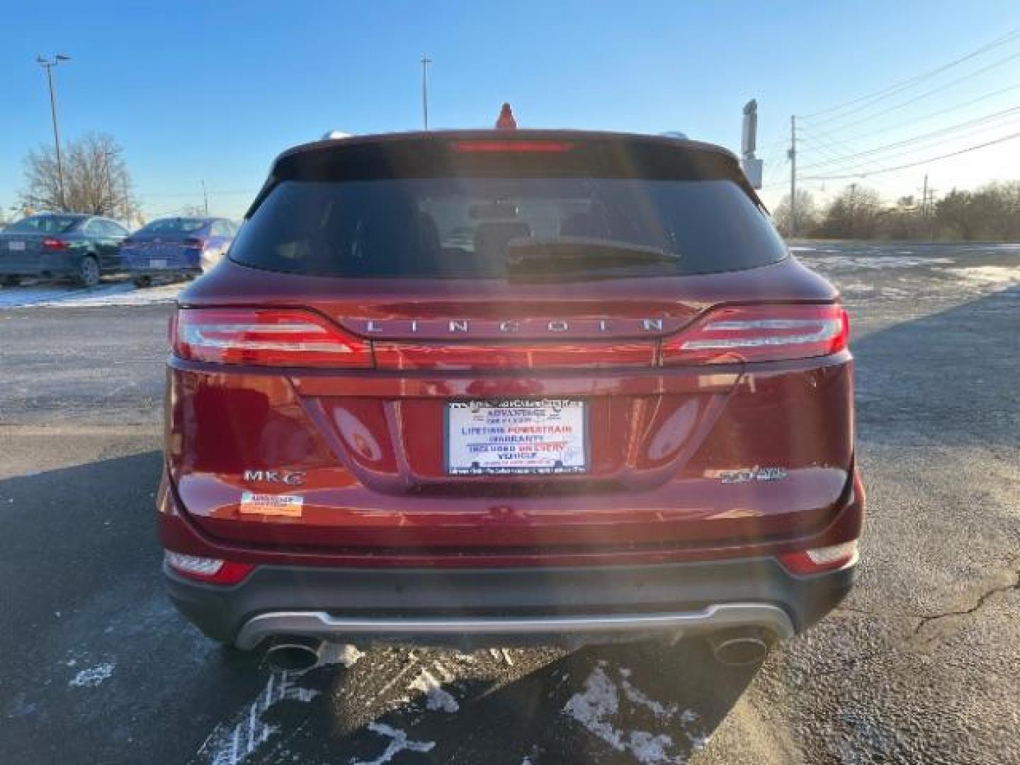 2015 Ruby Red Met Tinted CC Lincoln MKC AWD (5LMCJ2A94FU) with an 2.0L L4 DOHC 16V engine, 6-Speed Automatic transmission, located at 880 E. National Road, Vandalia, OH, 45377, (937) 908-9800, 39.891918, -84.183594 - Photo#2