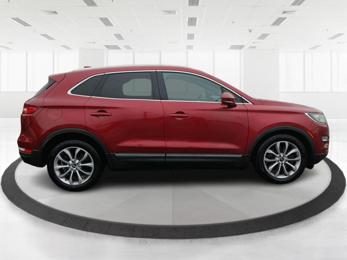 2015 Ruby Red Met Tinted CC Lincoln MKC AWD (5LMCJ2A9XFU) with an 2.0L L4 DOHC 16V engine, 6-Speed Automatic transmission, located at 8750 N County Rd 25A, Piqua, OH, 45356, (937) 908-9800, 40.164391, -84.232513 - Photo#1