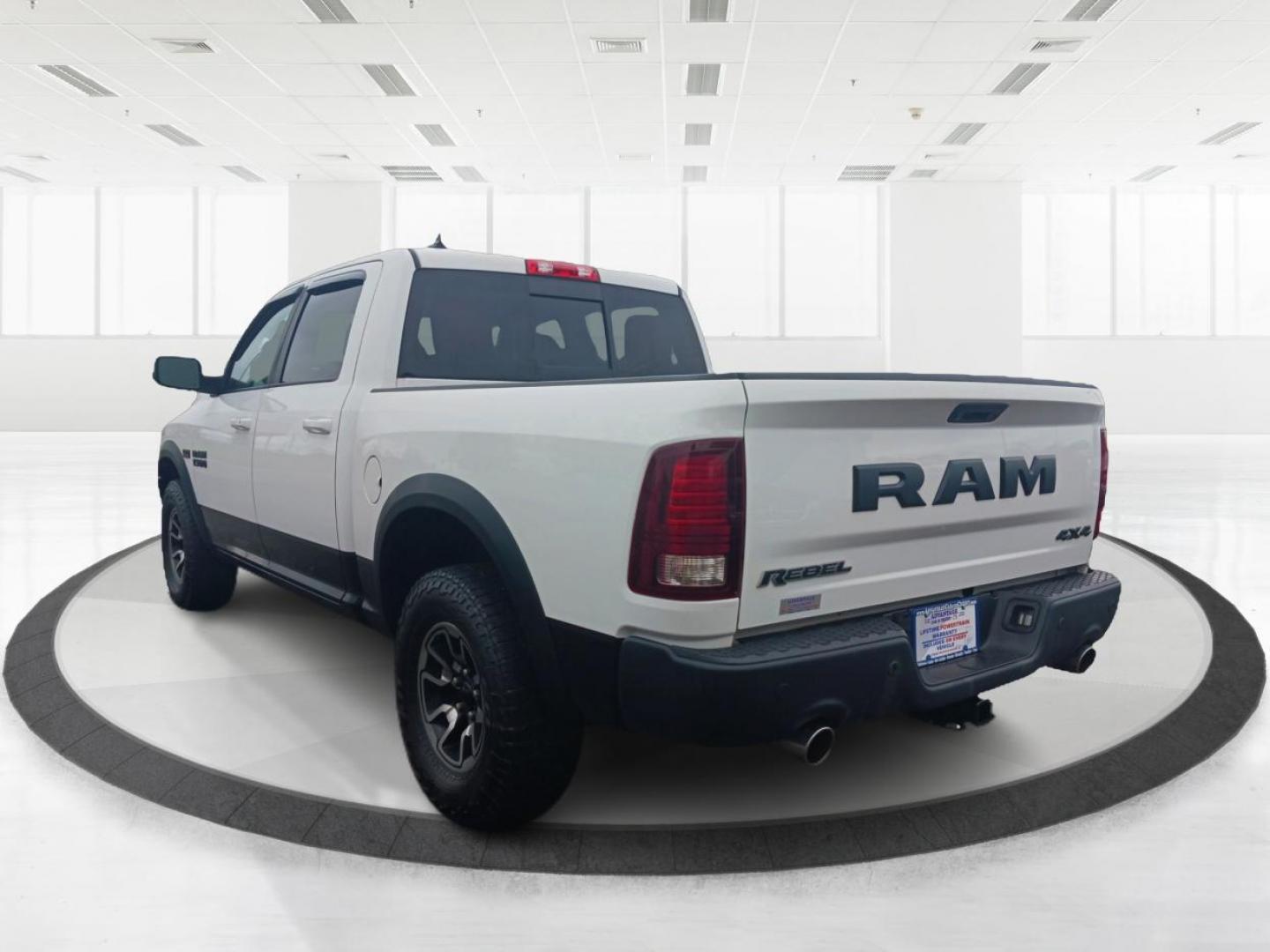 2015 White RAM 1500 Rebel Crew Cab SWB 4WD (1C6RR7YT7FS) with an 5.7L V8 OHV 16V engine, 6A transmission, located at 1230 East Main St, Xenia, OH, 45385, (937) 908-9800, 39.688026, -83.910172 - Photo#4