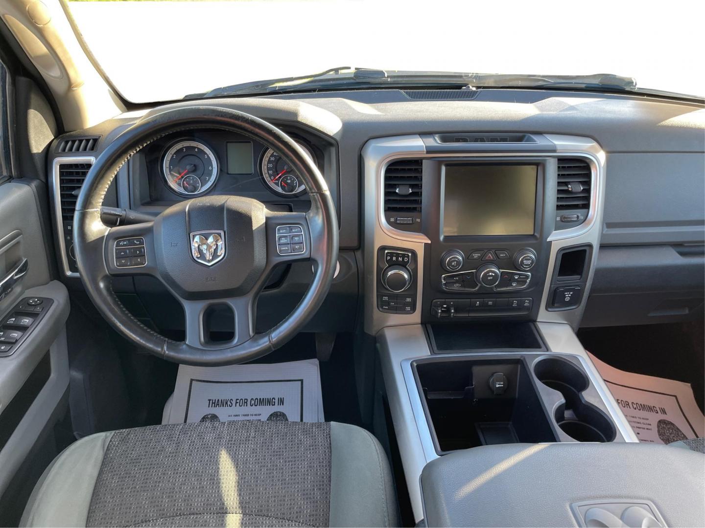 2015 Ram 1500 SLT Quad Cab 4WD (1C6RR7GT2FS) with an 5.7L V8 OHV 16V engine, 8-Speed Automatic transmission, located at 880 E. National Road, Vandalia, OH, 45377, (937) 908-9800, 39.891918, -84.183594 - 2015 Ram 1500 SLT Quad Cab 4WD - Photo#19