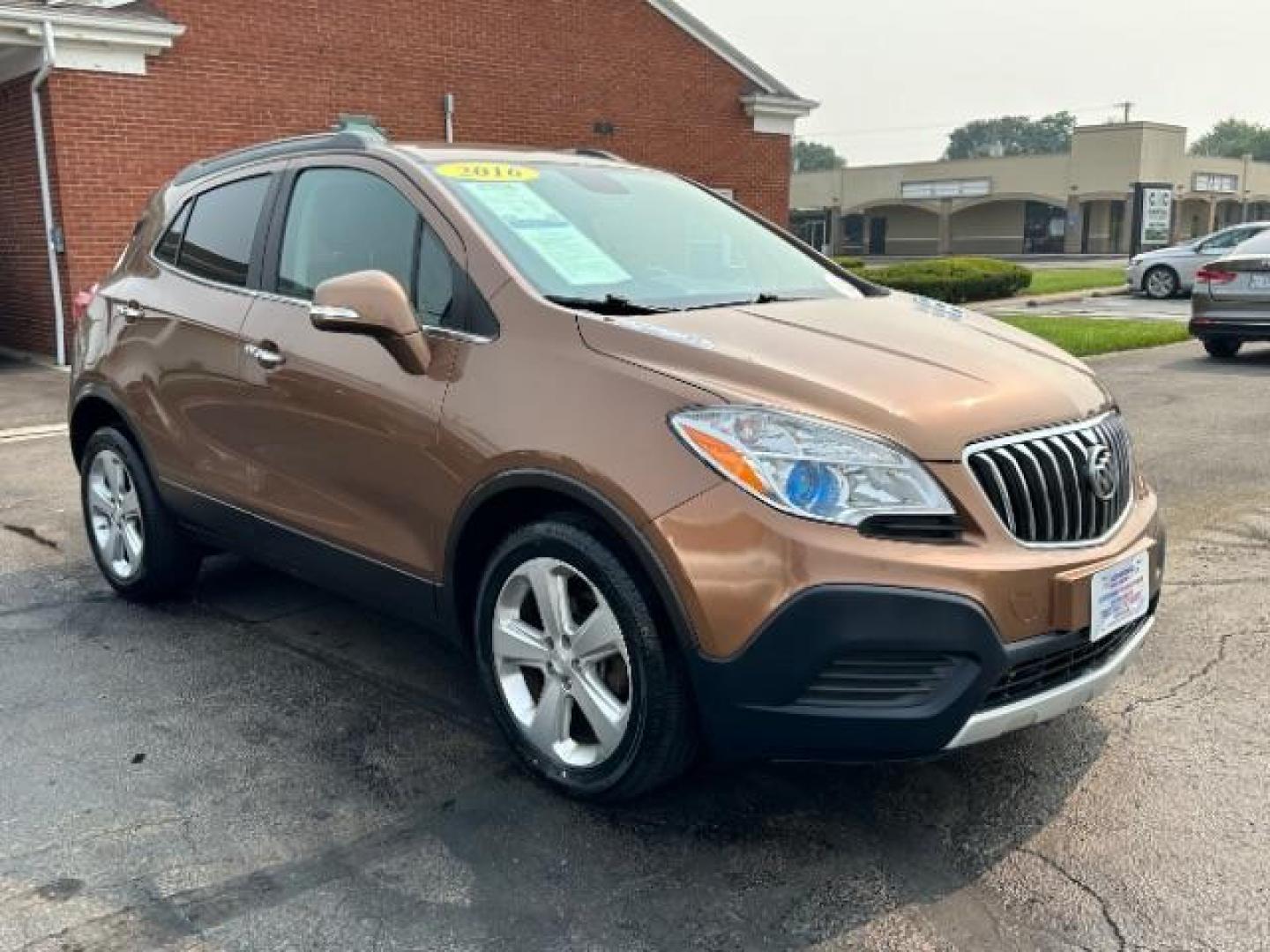 2016 River Rock Metallic/Dark Cocoa Ash Buick Encore Base FWD (KL4CJASB3GB) with an 1.4L L4 DOHC 16V TURBO engine, 6-Speed Automatic transmission, located at 401 Woodman Dr, Riverside, OH, 45431, (937) 908-9800, 39.760899, -84.123421 - Photo#0