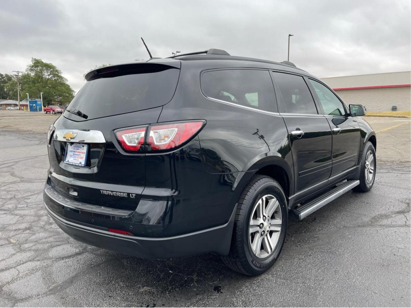 2016 Black Chevrolet Traverse 2LT AWD (1GNKVHKD8GJ) with an 3.6L V6 DOHC 24V engine, 6-Speed Automatic transmission, located at 1099 N County Rd 25A , Troy, OH, 45373, (937) 908-9800, 40.057079, -84.212883 - Photo#2