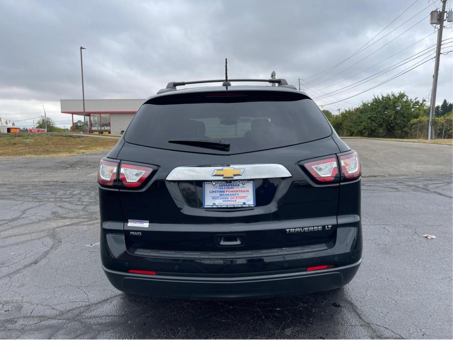 2016 Black Chevrolet Traverse 2LT AWD (1GNKVHKD8GJ) with an 3.6L V6 DOHC 24V engine, 6-Speed Automatic transmission, located at 1099 N County Rd 25A , Troy, OH, 45373, (937) 908-9800, 40.057079, -84.212883 - Photo#3