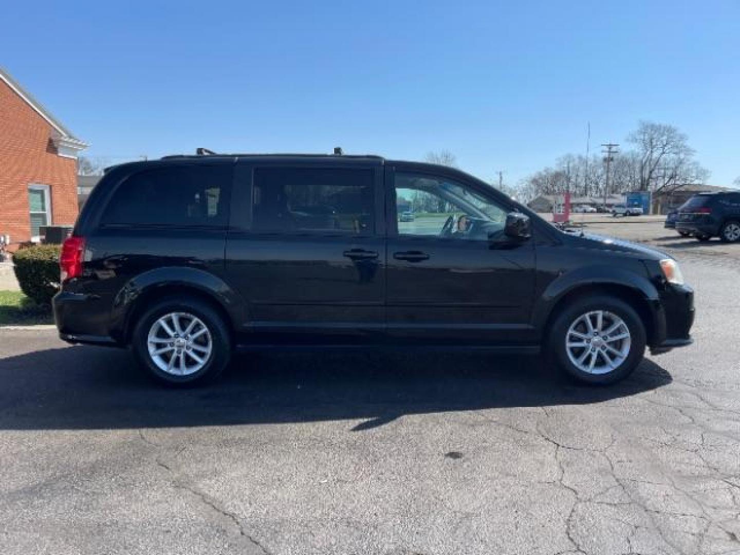 2016 Brilliant Black Crystal Pearl Coat Dodge Grand Caravan SXT (2C4RDGCG1GR) with an 3.6L V6 DOHC 24V engine, 6-Speed Automatic transmission, located at 401 Woodman Dr, Riverside, OH, 45431, (937) 908-9800, 39.760899, -84.123421 - Photo#3