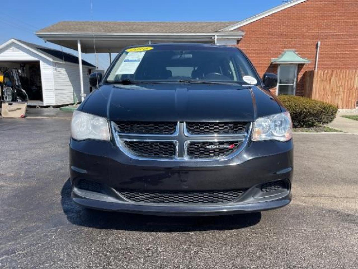 2016 Brilliant Black Crystal Pearl Coat Dodge Grand Caravan SXT (2C4RDGCG1GR) with an 3.6L V6 DOHC 24V engine, 6-Speed Automatic transmission, located at 401 Woodman Dr, Riverside, OH, 45431, (937) 908-9800, 39.760899, -84.123421 - Photo#4