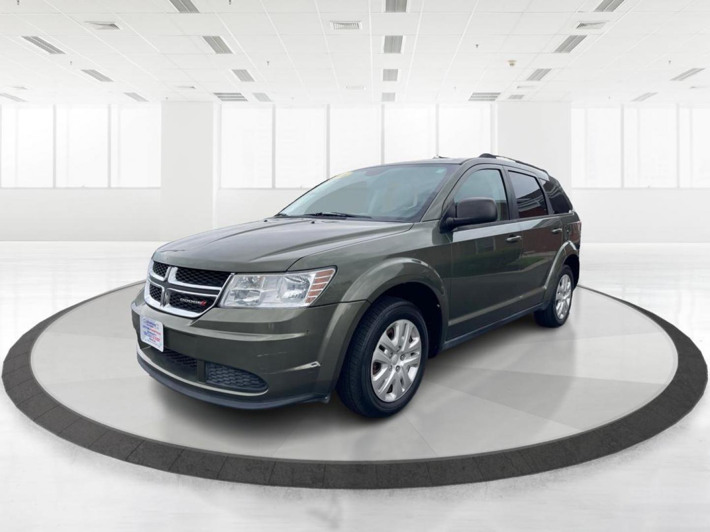 2016 Granite Crystal Metallic Clear Coat Dodge Journey SE (3C4PDCAB6GT) with an 2.4L L4 DOHC 16V engine, 4A transmission, located at 4508 South Dixie Dr, Moraine, OH, 45439, (937) 908-9800, 39.689976, -84.218452 - Photo#7