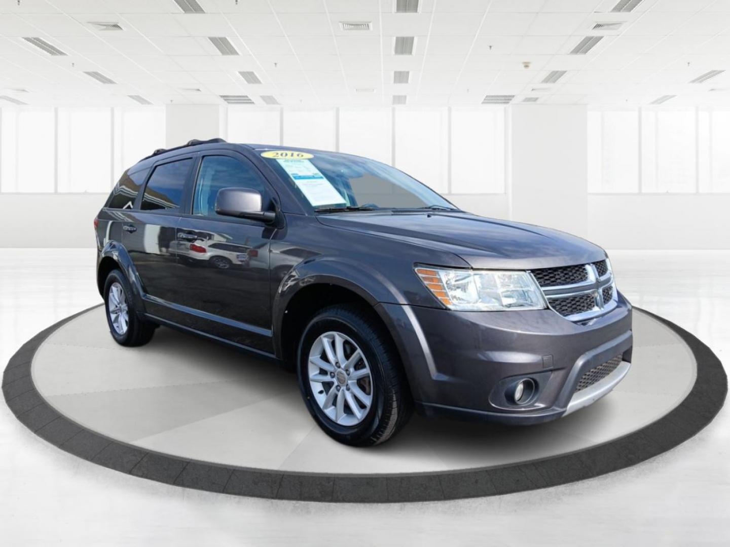 2016 Granite Crystal Metallic Clear Coat Dodge Journey SXT AWD (3C4PDDBGXGT) with an 3.6L V6 DOHC 24V engine, 6A transmission, located at 1184 Kauffman Ave, Fairborn, OH, 45324, (937) 908-9800, 39.807072, -84.030914 - Photo#0