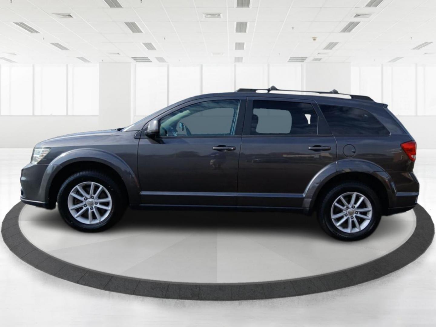 2016 Granite Crystal Metallic Clear Coat Dodge Journey SXT AWD (3C4PDDBGXGT) with an 3.6L V6 DOHC 24V engine, 6A transmission, located at 1184 Kauffman Ave, Fairborn, OH, 45324, (937) 908-9800, 39.807072, -84.030914 - Photo#5