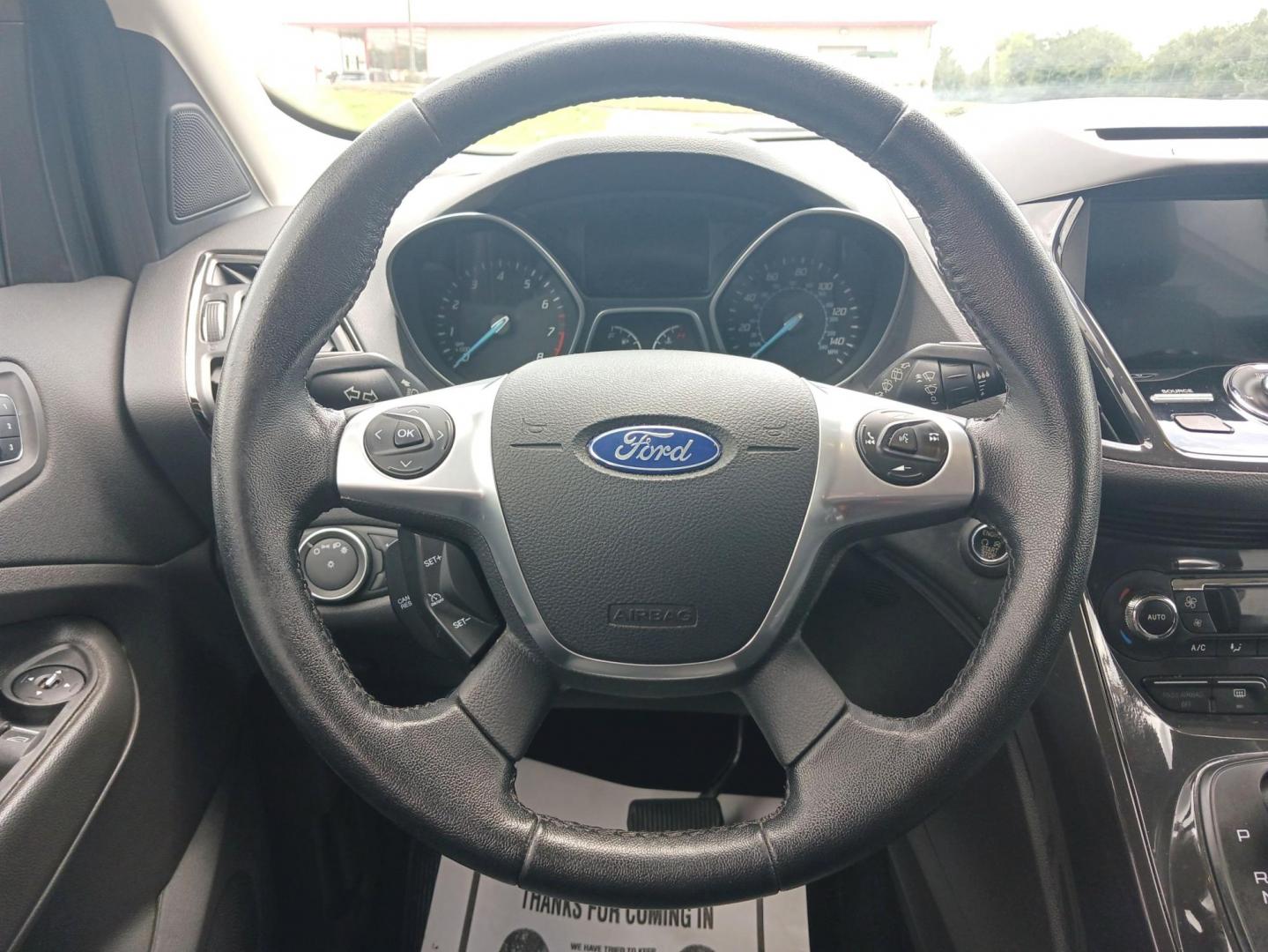 2016 Shadow Black Ford Escape (1FMCU9J9XGU) with an 2.0L L4 DOHC 16V engine, 6-Speed Automatic transmission, located at 1184 Kauffman Ave, Fairborn, OH, 45324, (937) 908-9800, 39.807072, -84.030914 - Photo#15