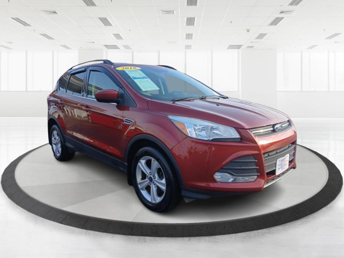 2016 Sunset Metallic Ford Escape SE 4WD (1FMCU9G95GU) with an 2.0L L4 DOHC 16V engine, 6-Speed Automatic transmission, located at 4508 South Dixie Dr, Moraine, OH, 45439, (937) 908-9800, 39.689976, -84.218452 - Photo#0