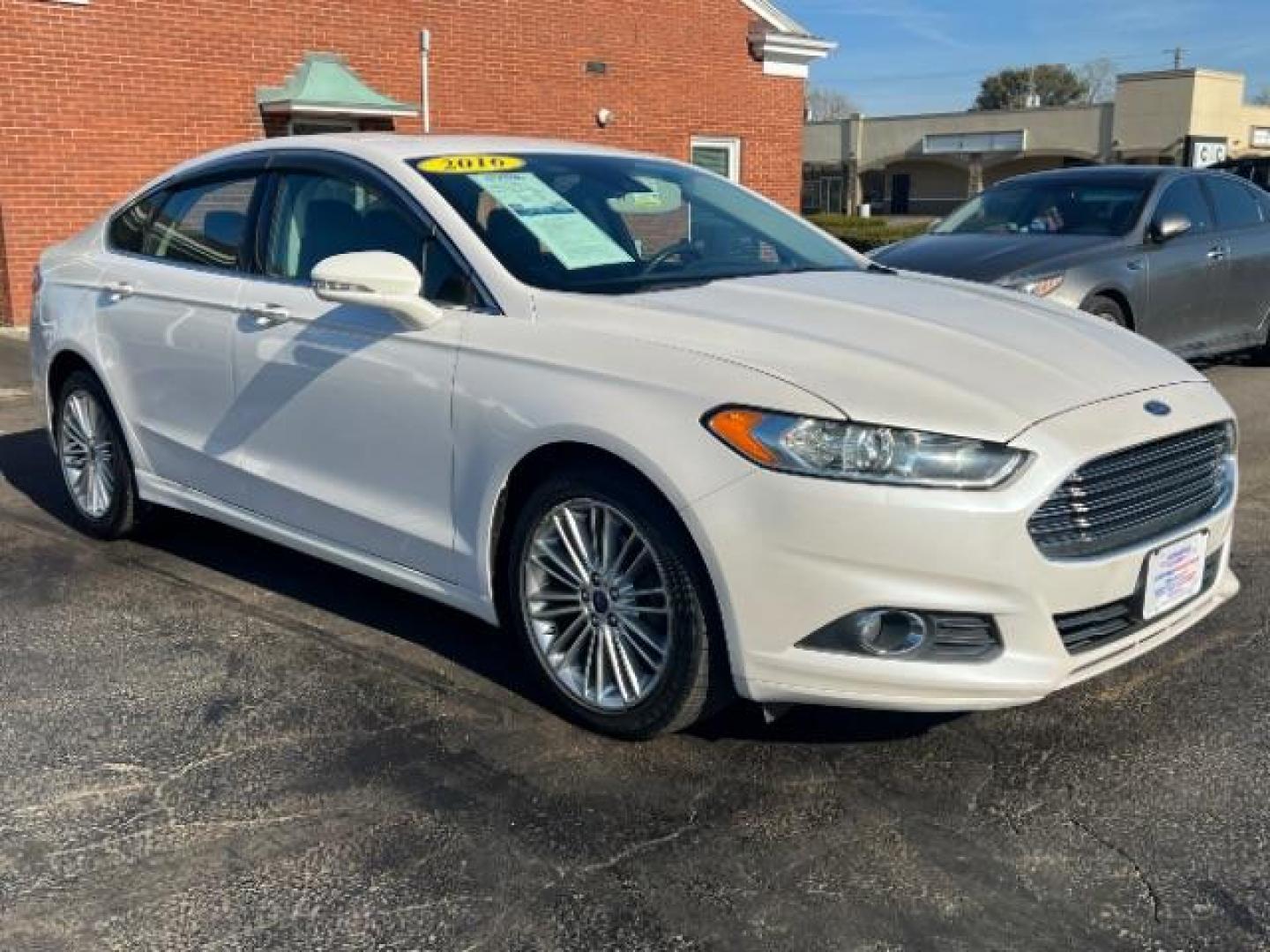 2016 White Platinum Metallic Tri-Coat Ford Fusion SE AWD (3FA6P0T92GR) with an 2.0L L4 DOHC 16V engine, 6-Speed Automatic transmission, located at 880 E. National Road, Vandalia, OH, 45377, (937) 908-9800, 39.891918, -84.183594 - Photo#0